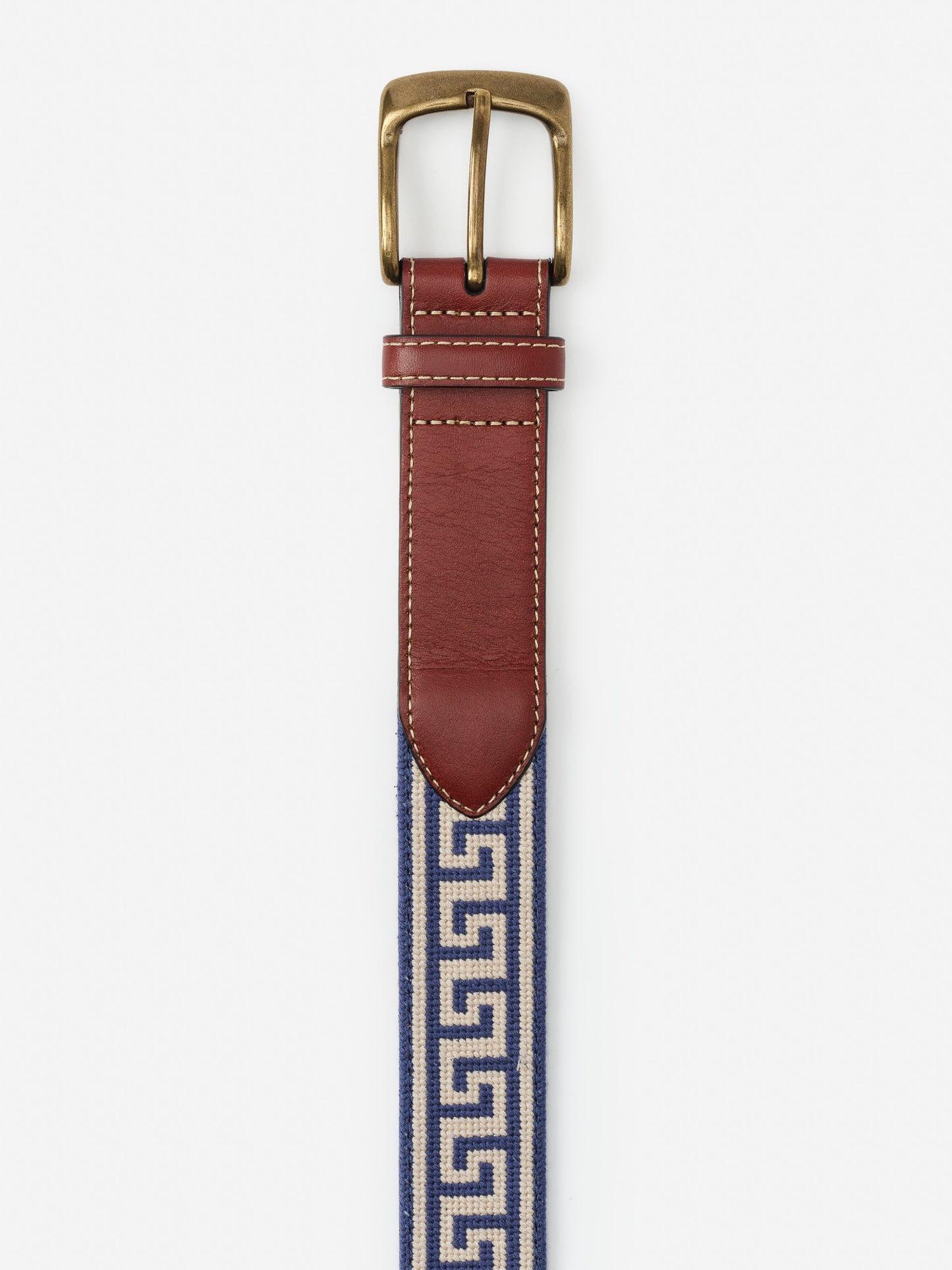 Needlepoint Belt in Greek Key by J.McLaughlin featuring a blue and cream Greek key pattern, rich brown leather accents, and a brass buckle for timeless style.