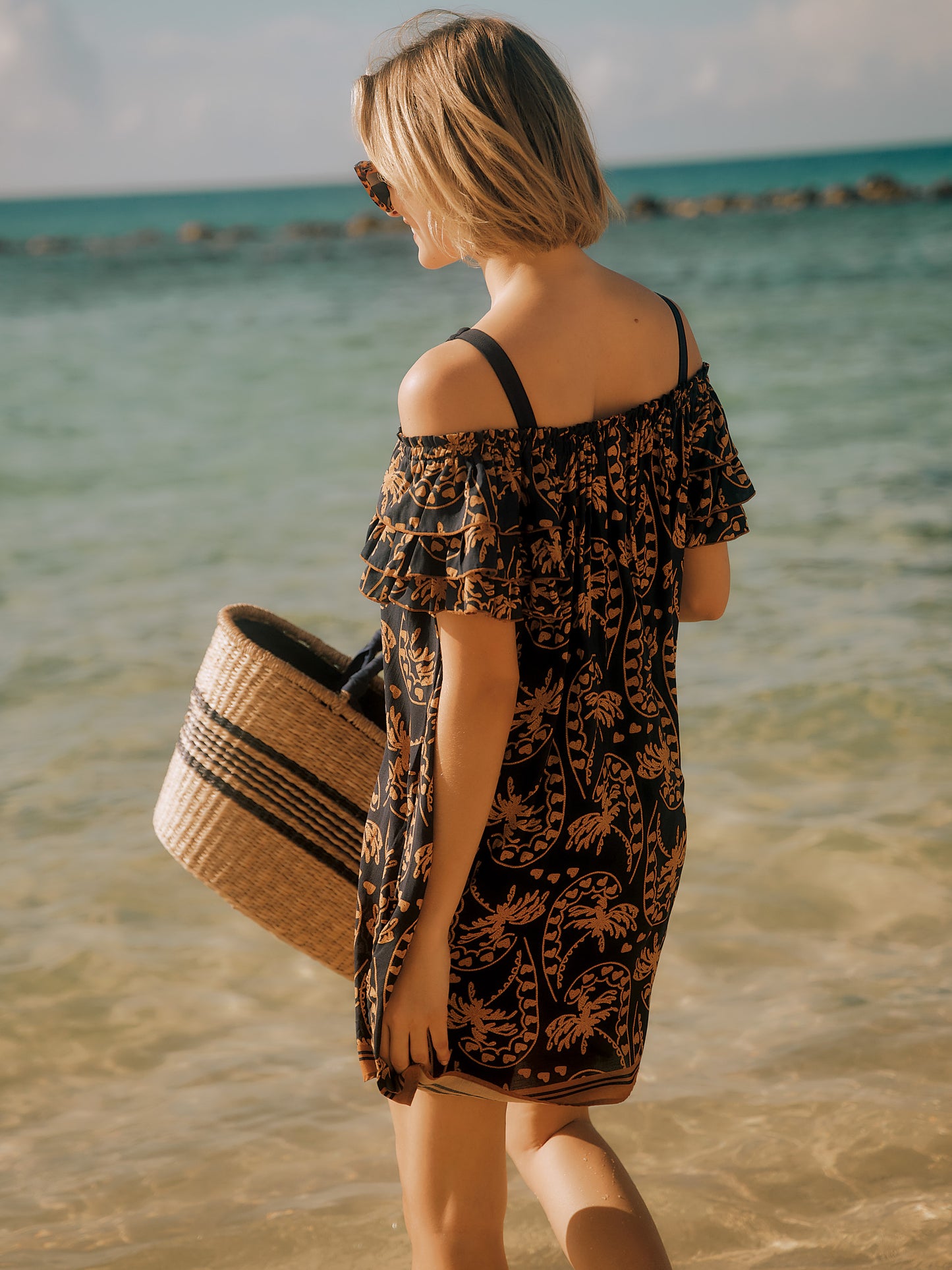 J.McLaughlin Coletta coverup in dark navy made with viscose/polyester.
