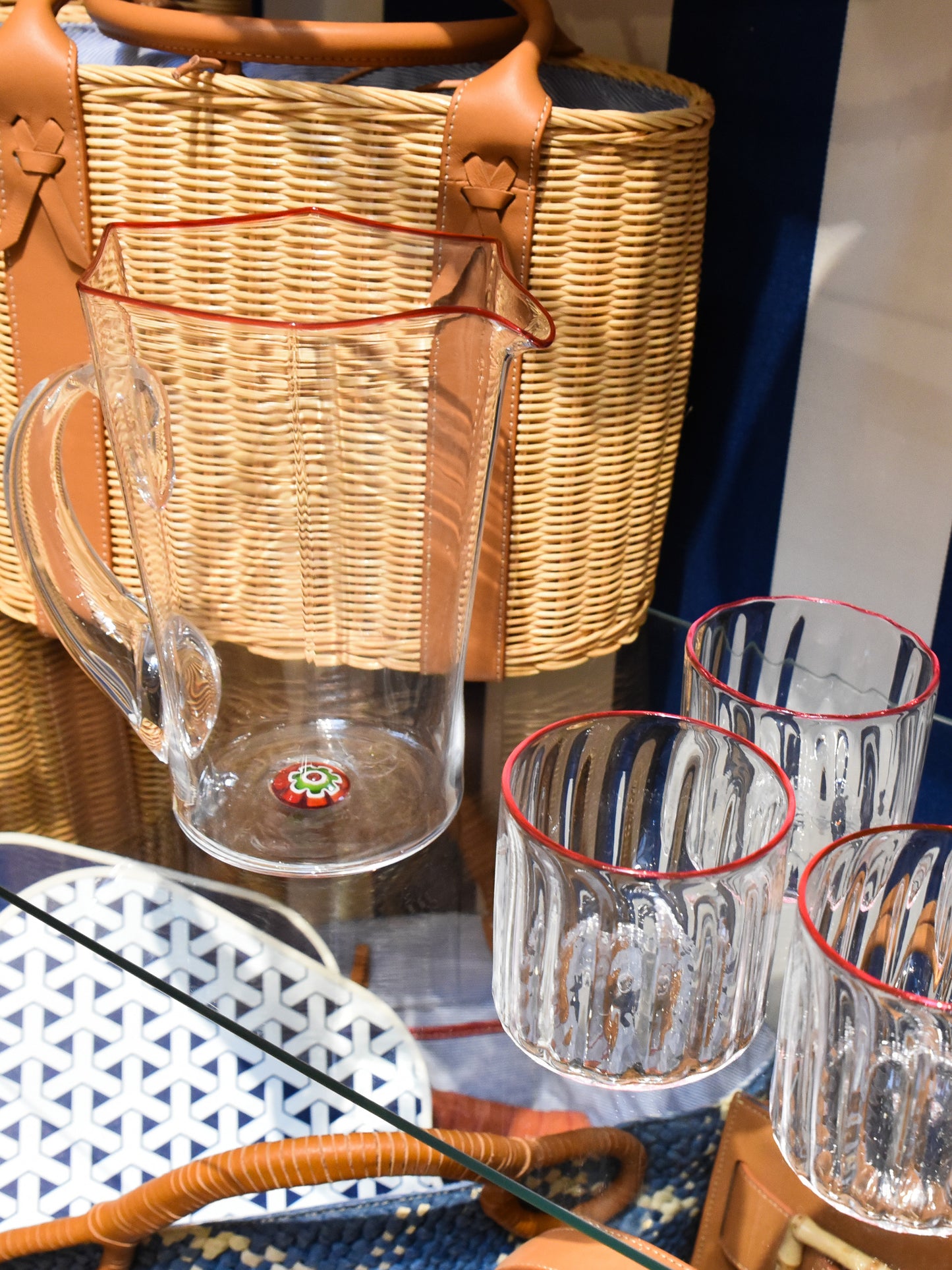 J.McLaughlin Cocktail glass in ruby red rim made with glass.