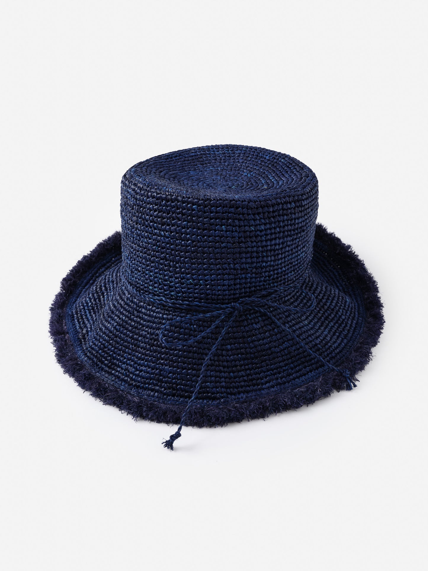Anna Straw Hat by J.McLaughlin in deep navy with woven texture and delicate tie detail, showcasing effortlessly stylish, enduring designs and innovative fabrics for a legacy of timeless fashion.