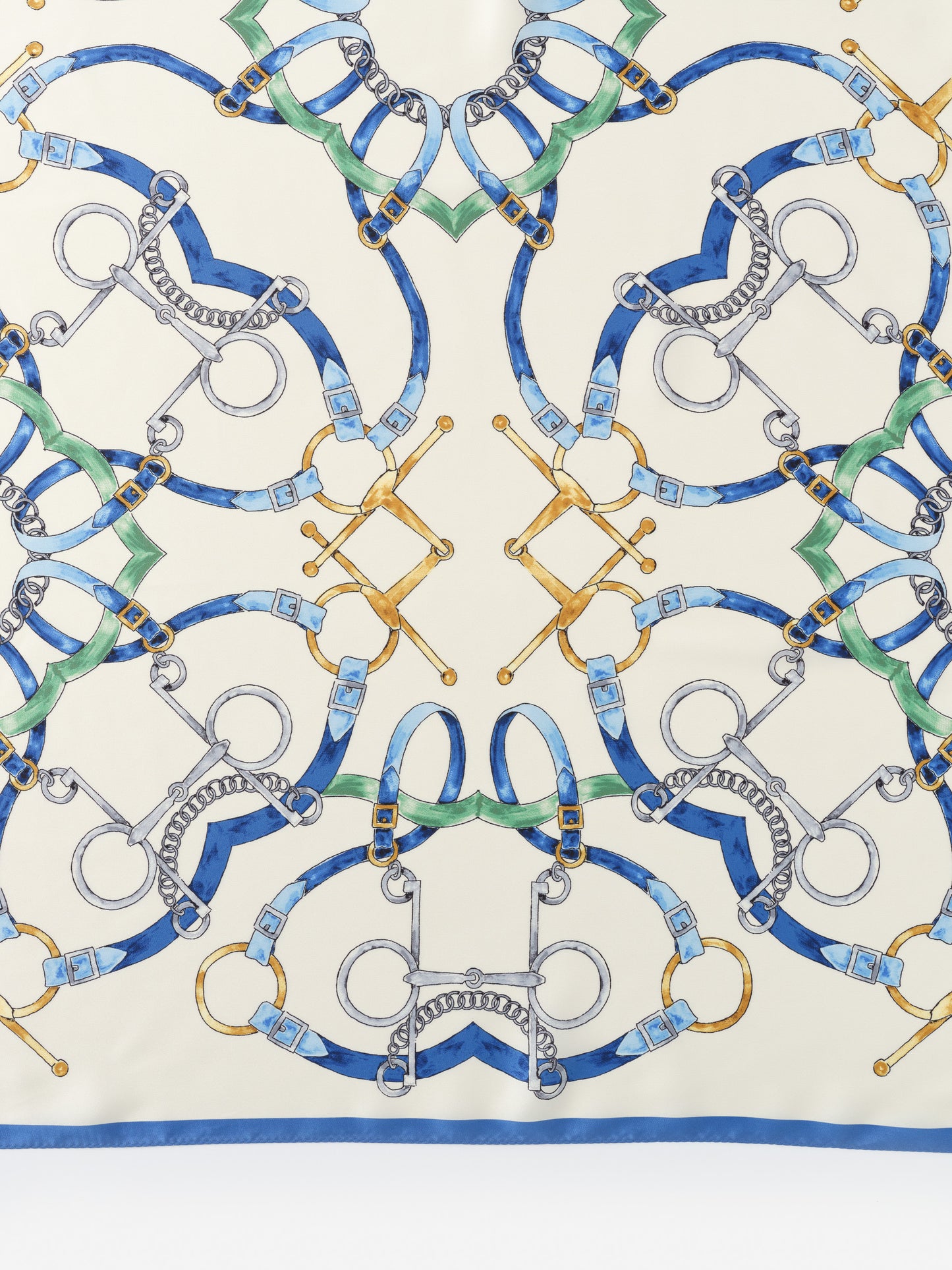 The Magic Scarf in Modern Dressage Border by J.McLaughlin features an intricate equestrian-inspired pattern in blue, green, and gold tones, showcasing effortlessly stylish, enduring designs with innovative fabrics—a destination for defining style. Life, Well-Lived.