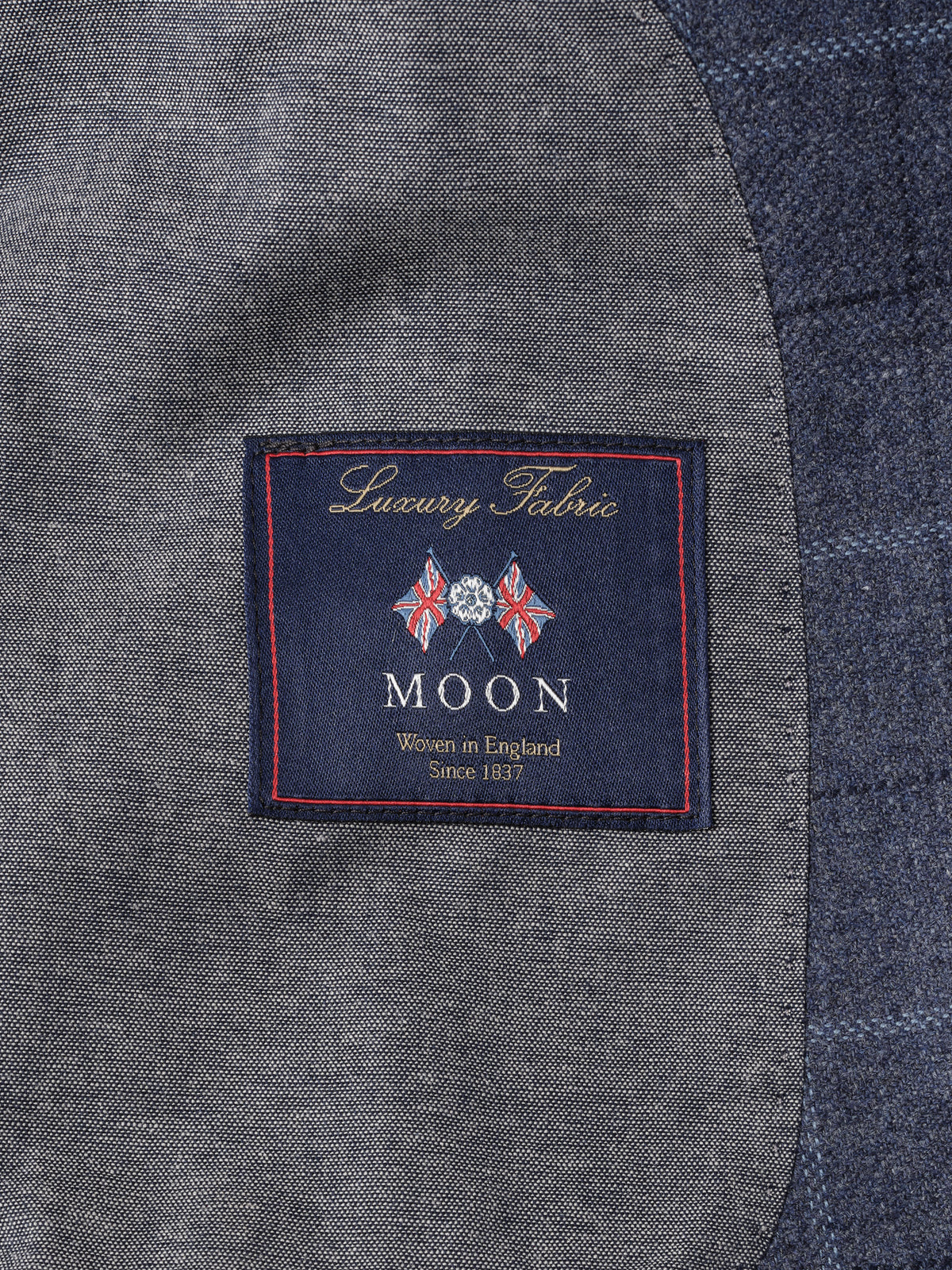 J.McLaughlin Suffolk Wool Sport Coat in Window Pane with a Luxury Fabric label from heritage British mill Abraham Moon woven in England since 1837