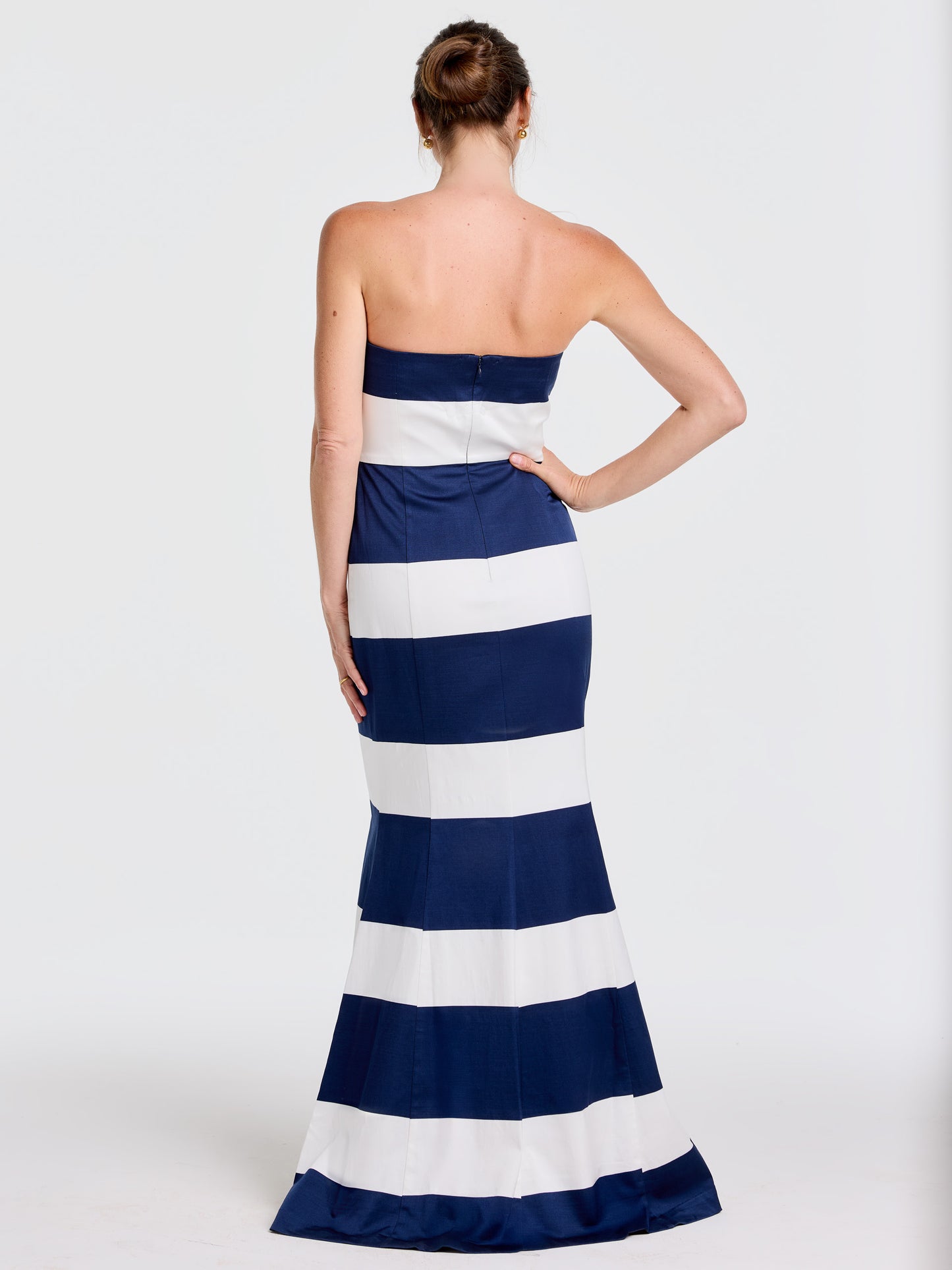 Woman modeling the Ashley Dress in Mega Mariner Stripe by J.McLaughlin, featuring effortlessly stylish, enduring designs with bold navy and white horizontal stripes, perfect for a life well-lived.