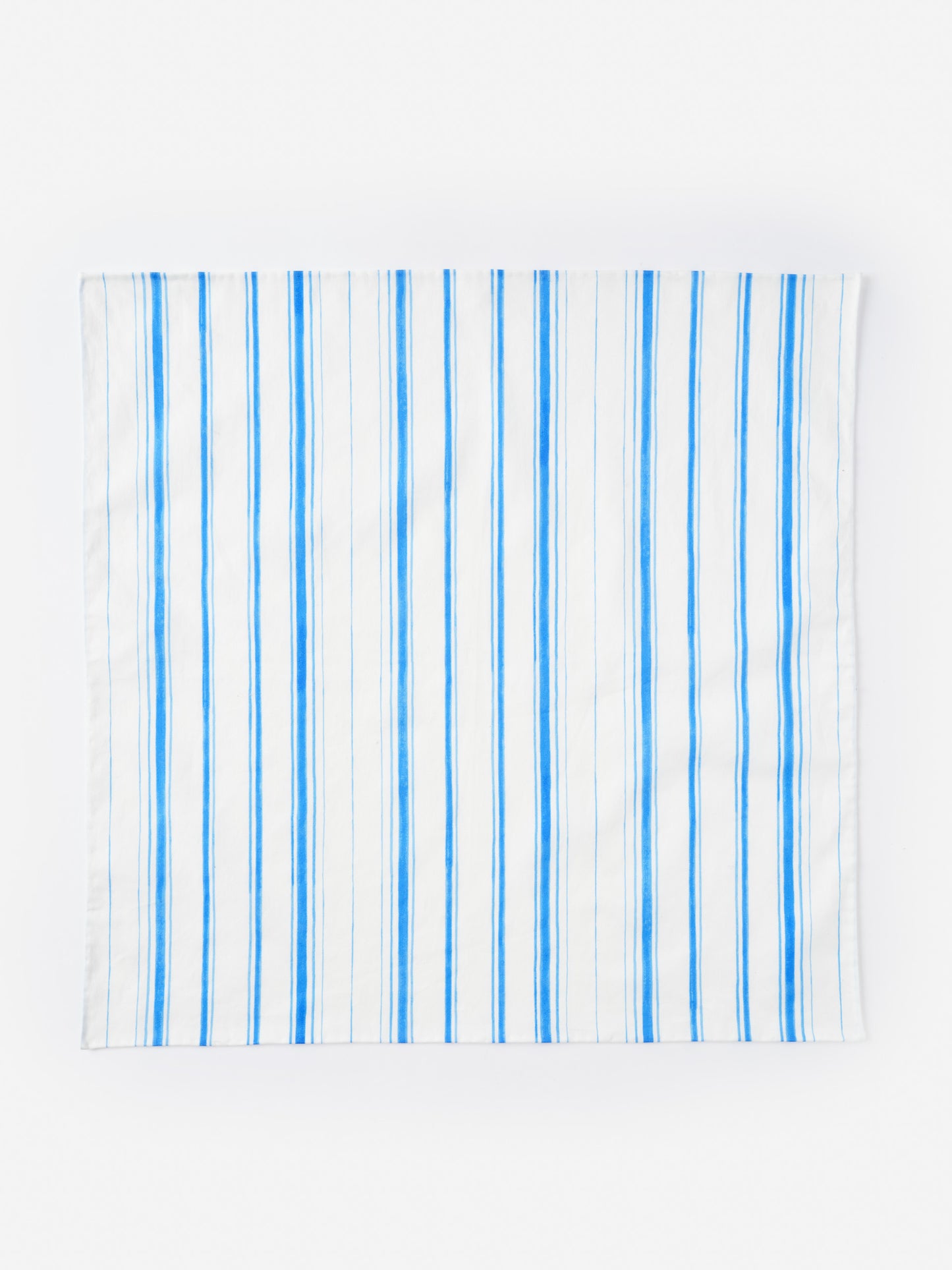 Ralph Neckerchief in Coastal Waterline by J.McLaughlin features effortlessly stylish blue and white stripes, crafted with innovative fabrics for enduring designs. A destination for defining style. Life, Well-Lived.