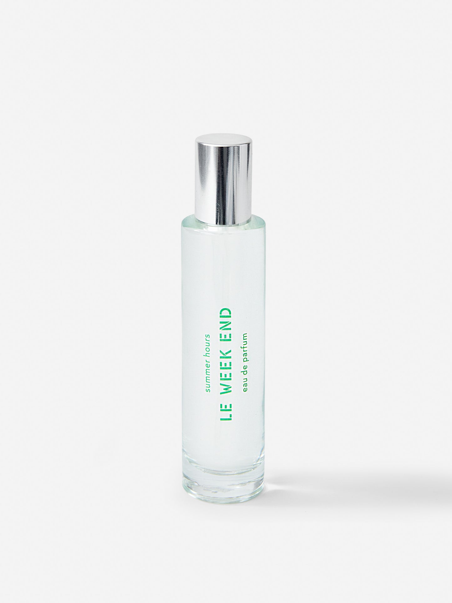 J.McL x Summer Hours Le Week End 50 mL Fragrance in green made with alcohol and water.