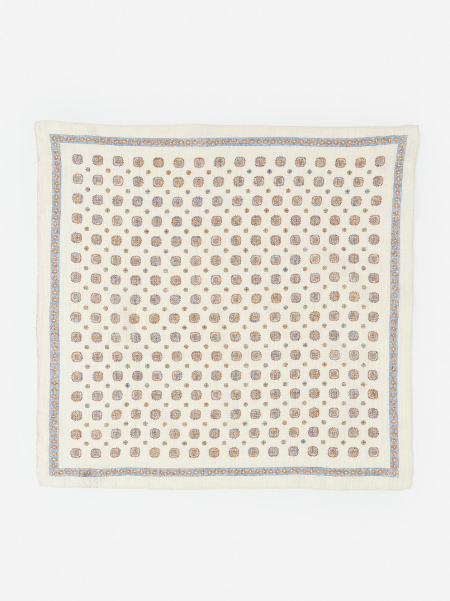 Seersucker Bandana in Stratford Square by J.McLaughlin featuring a classic cream base with a subtle blue and brown geometric pattern, perfect accessory for timeless style.