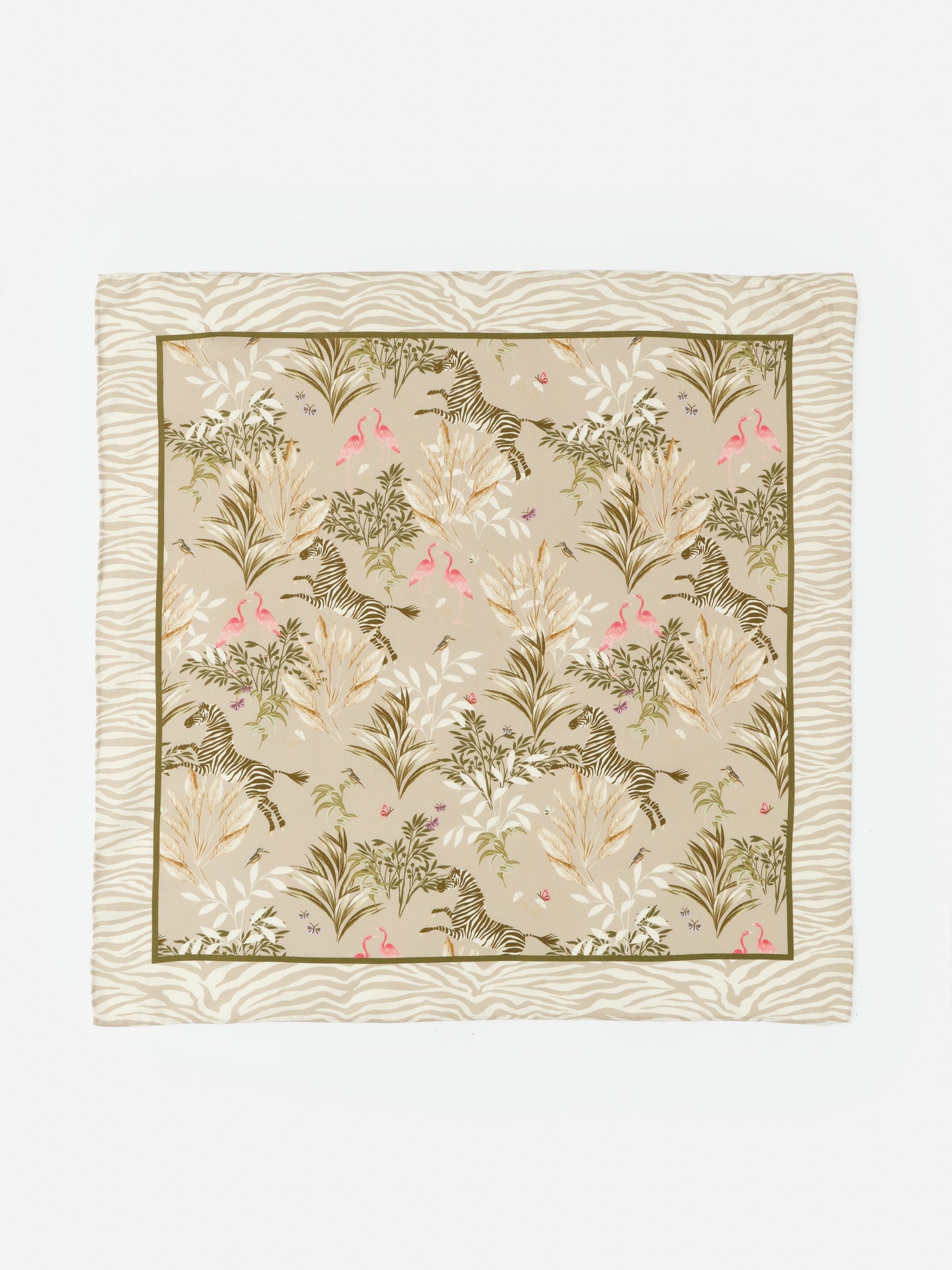 Nikka Silk Scarf in Zebra Story Court by J.McLaughlin features an effortlessly stylish design with zebra and flamingo motifs on a soft beige background, showcasing enduring designs and a legacy of timeless fashion. A destination for defining style. Life, Well-Lived.