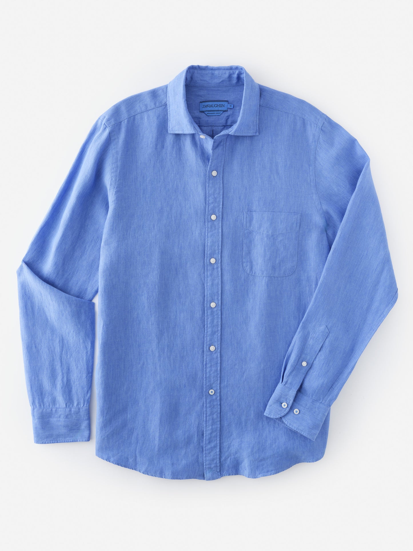 Gramercy Linen Shirt by J.McLaughlin in soft blue linen, showcasing effortlessly stylish design and enduring quality for a legacy of timeless fashion. A destination for defining style. Life, Well-Lived.