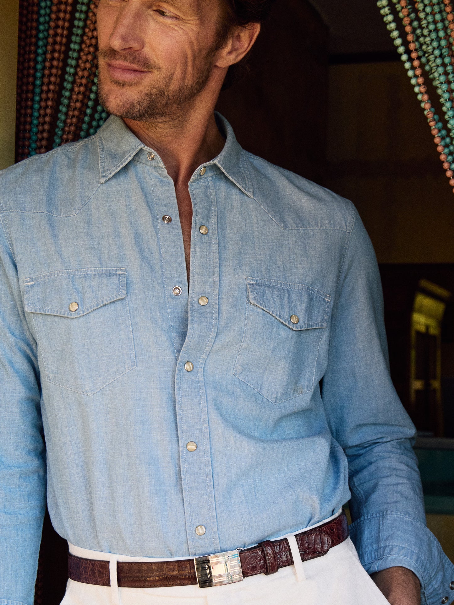 J.McLaughlin Ace high woven shirt in light denim blue made with cotton chambray.