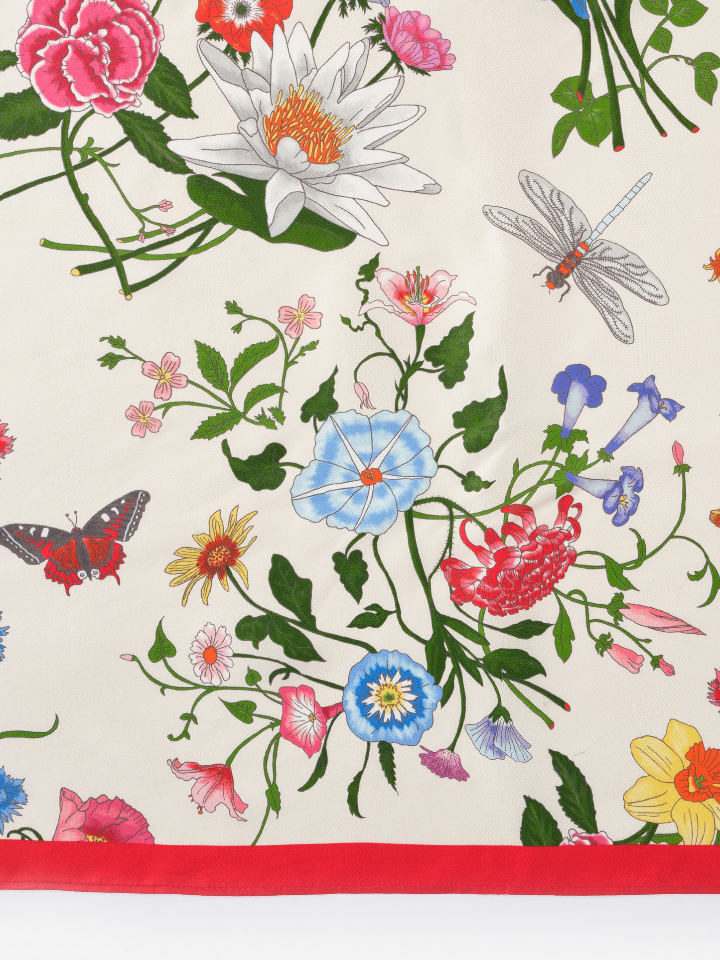 Kyleigh Silk Scarf in Dragonfly Garden by J.McLaughlin showcases an effortlessly stylish floral and insect motif on silk, blending enduring designs with a legacy of timeless fashion. A destination for defining style. Life, Well-Lived.