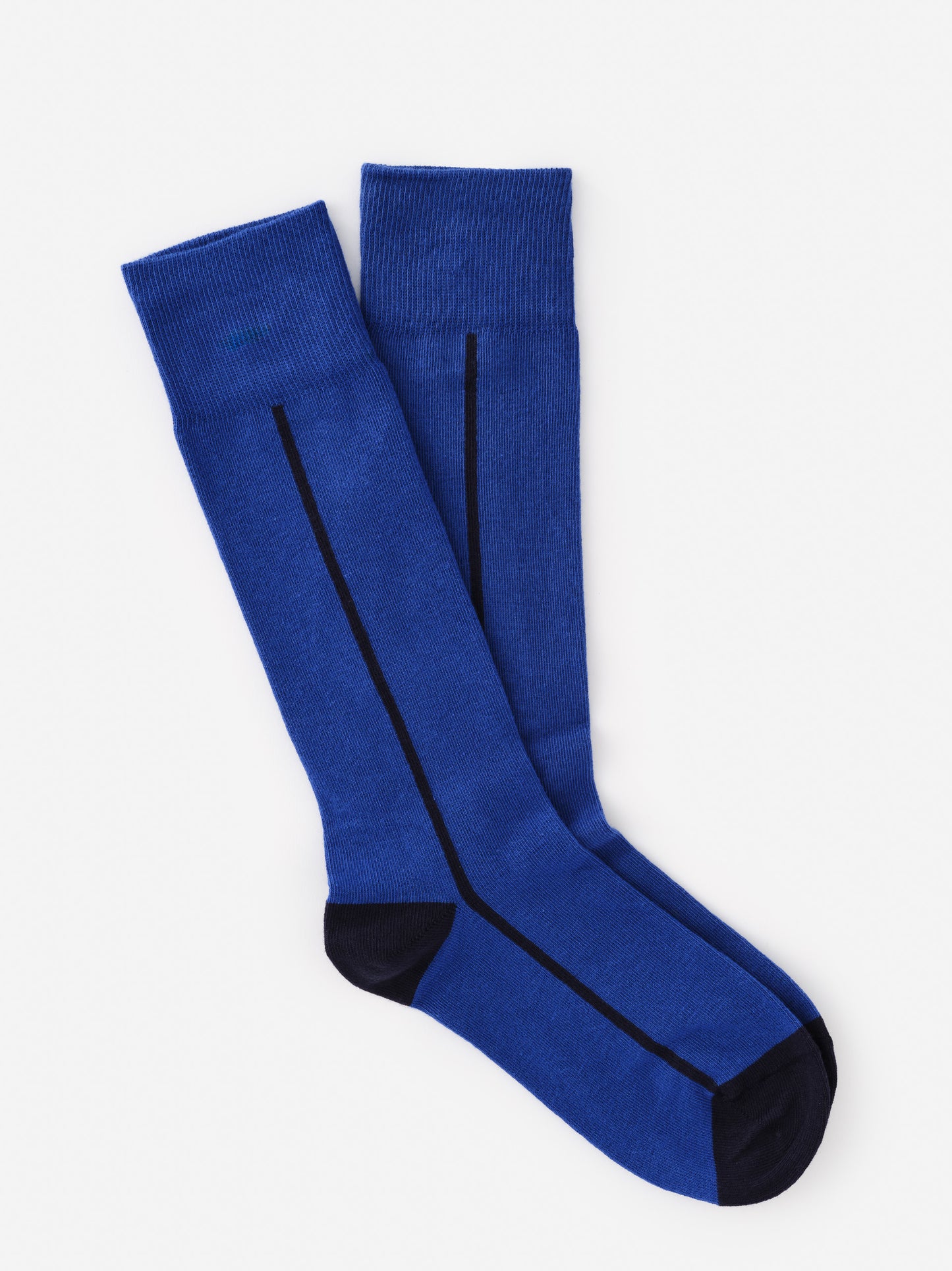Socks in Line by J.McLaughlin in a rich blue tone with black accents on heel and toe, featuring effortless style and enduring designs for a destination of defining style. Life, Well-Lived.