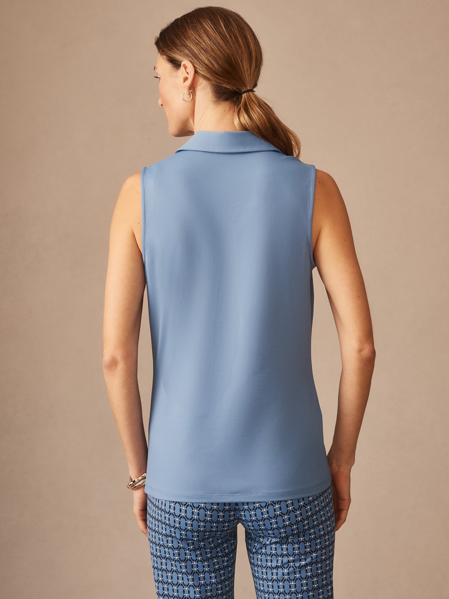 Aida Sleeveless Top by J.McLaughlin in seaside blue, showcasing effortlessly stylish, enduring designs and innovative fabrics for a legacy of timeless fashion. A destination for defining style. Life, Well-Lived.