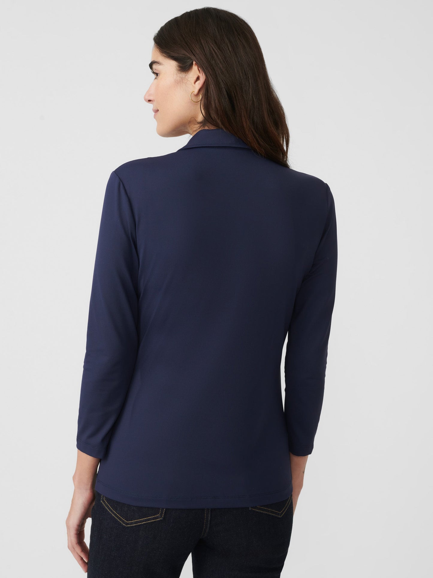 Model wearing J.McLaughlin Aida 3/4 sleeve top in winter navy made with Catalina cloth.