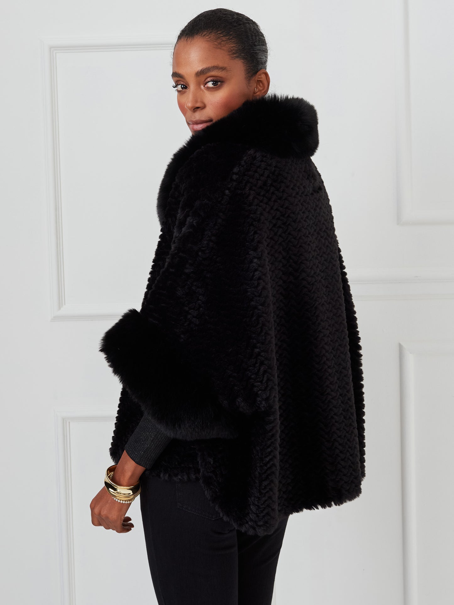 J.McLaughlin Andie ponchos in black made with faux fur.