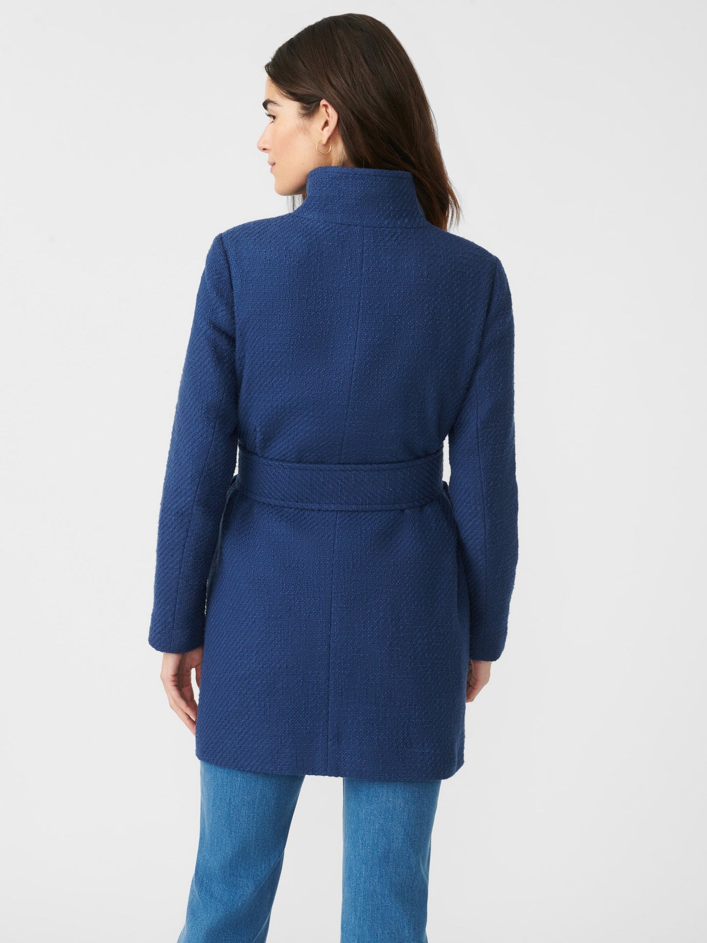Model wears J.McLaughlin Arden Tweed Coat in navy made with cotton.