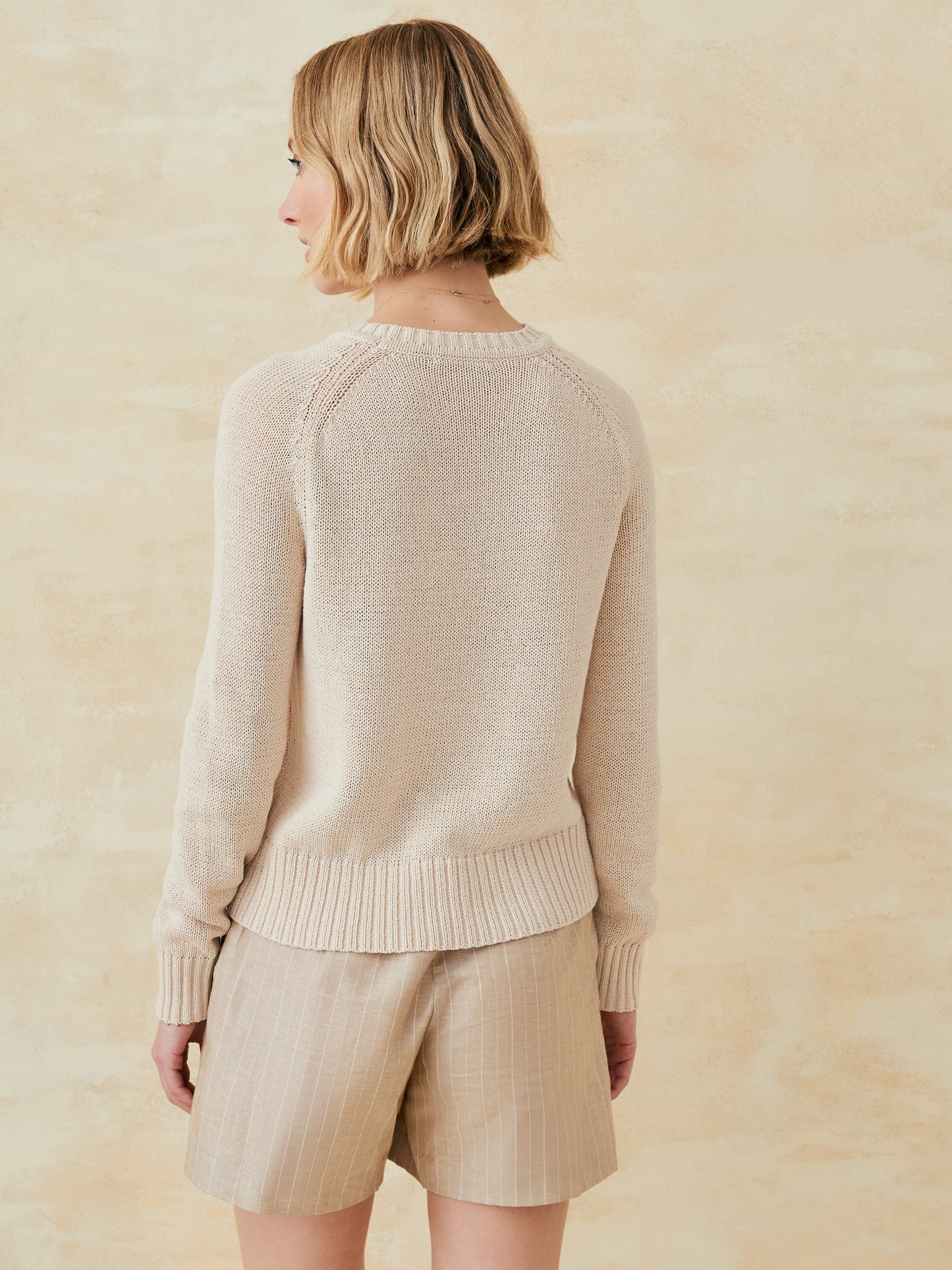 J.McLaughlin Asher sweater in light oatmeal made with linen/cotton.