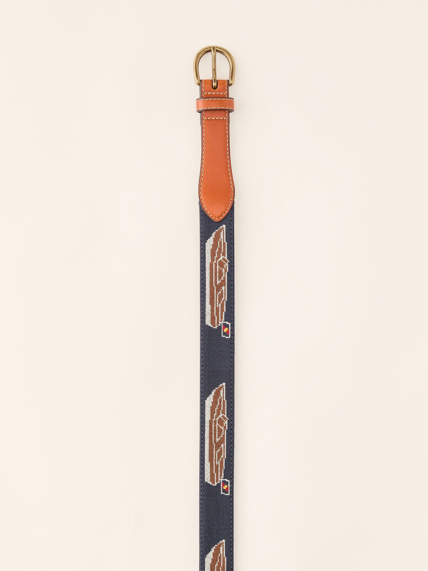 J.McLaughlin Needlepoint belt in navy made with leather and cotton needlepoint fabric.