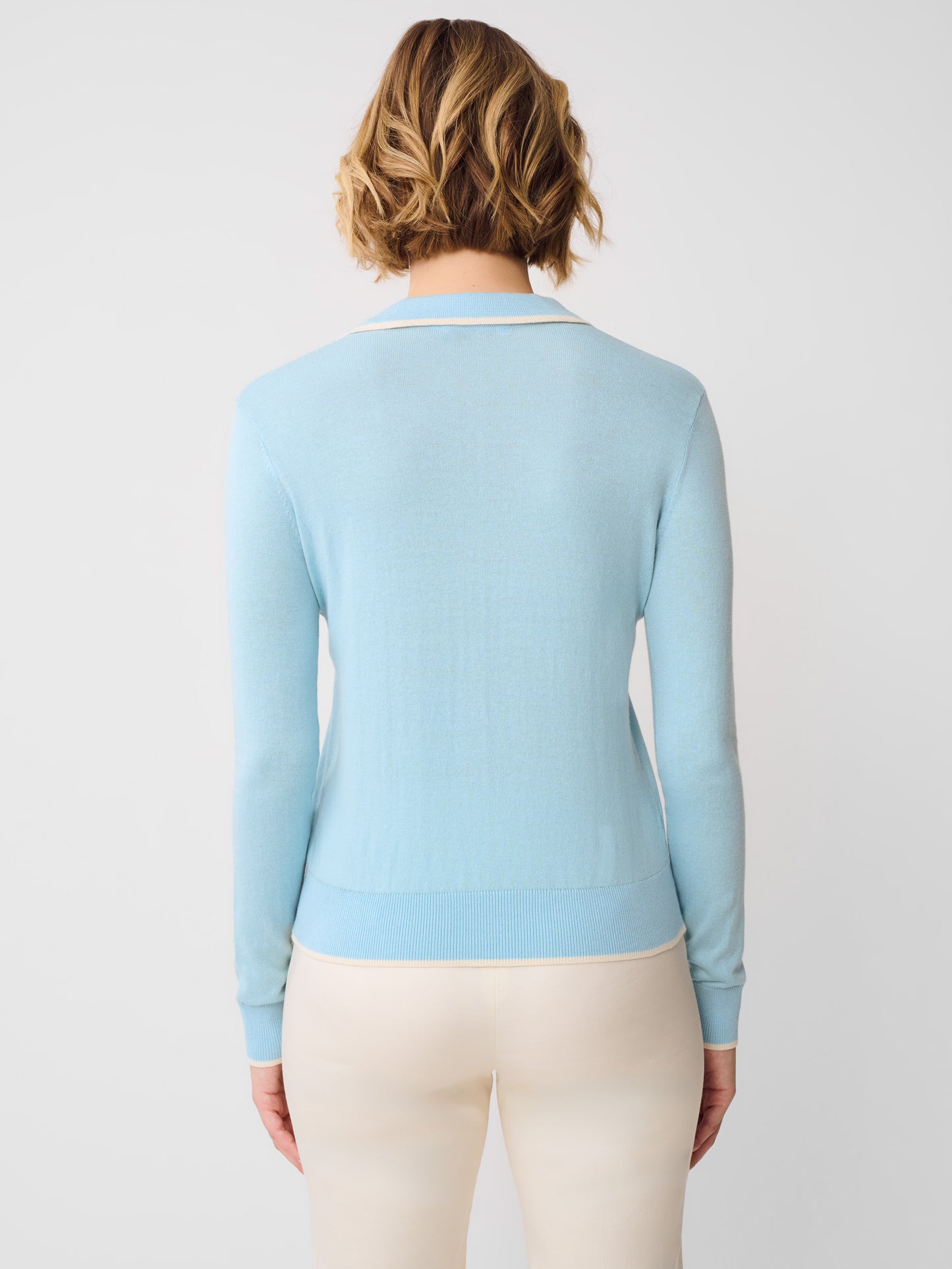 J.McLaughlin Bettina sweater in light blue/off white made with Somerset yarn.