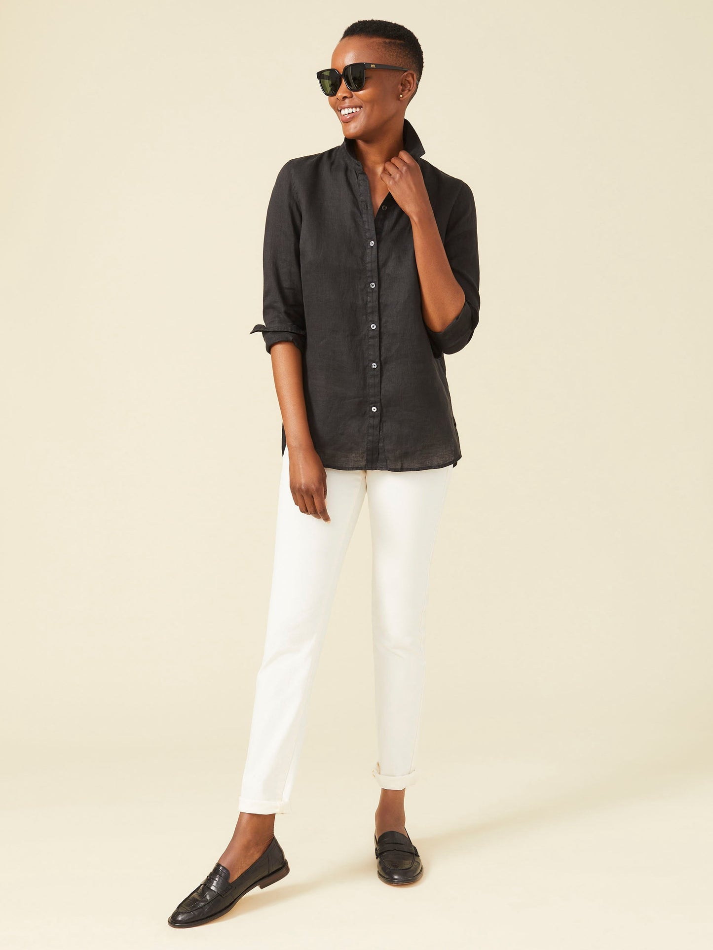 Model wearing J.McLaughlin Britt shirt in black made with linen.