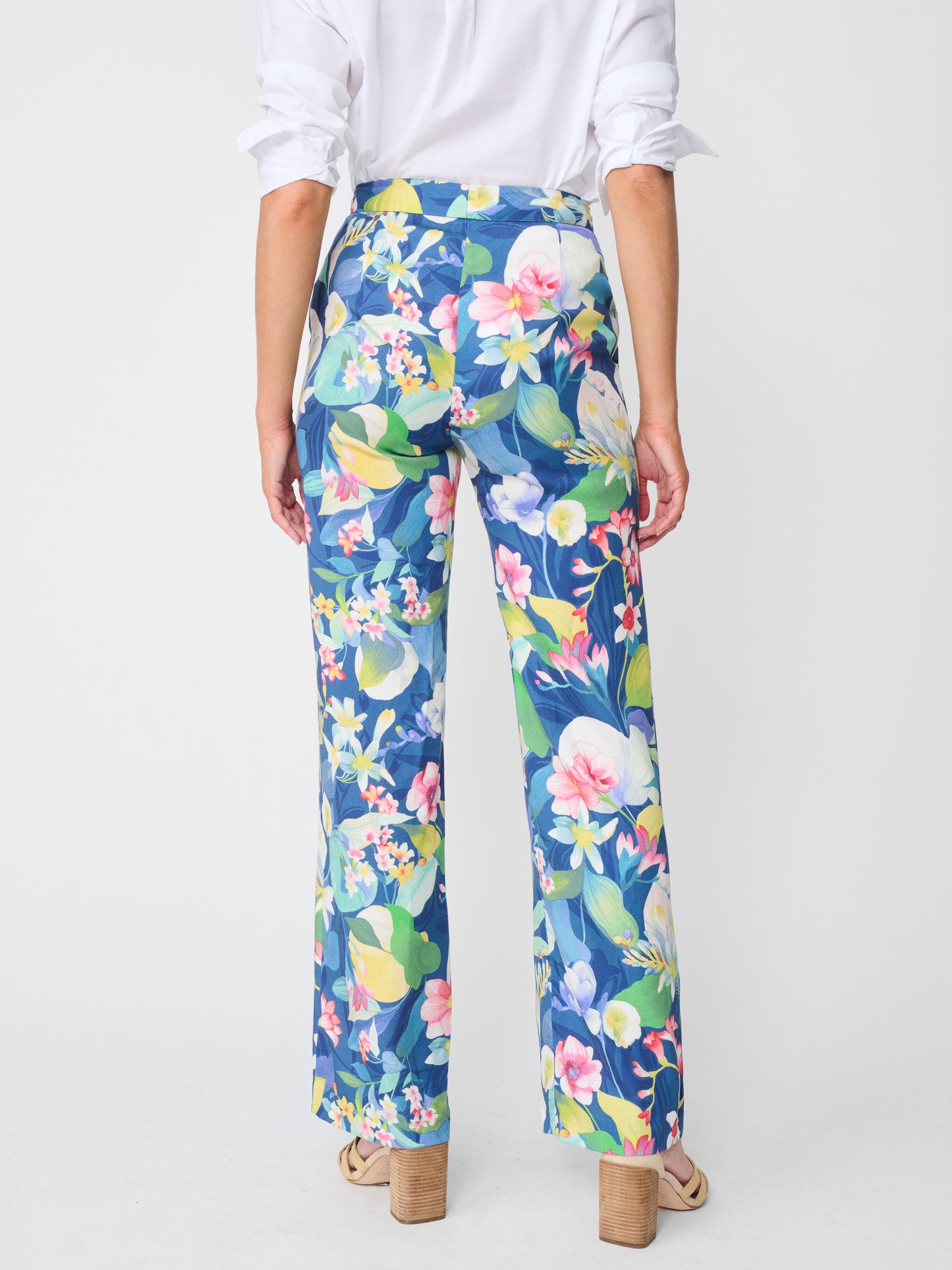 Model wearing J.McLaughlin Broderick pants in navy/multi made with tencel.