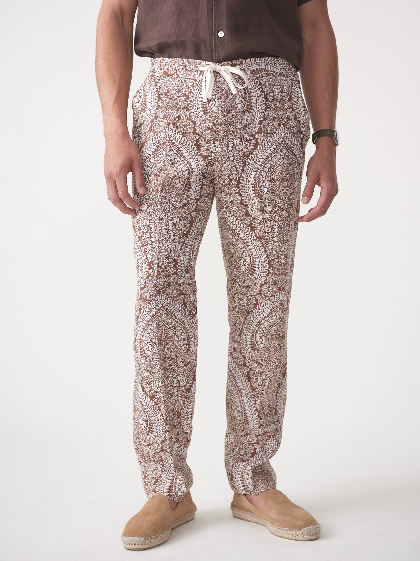 Model wearing J.McLaughlin Callister pants in off white/brown made with linen.