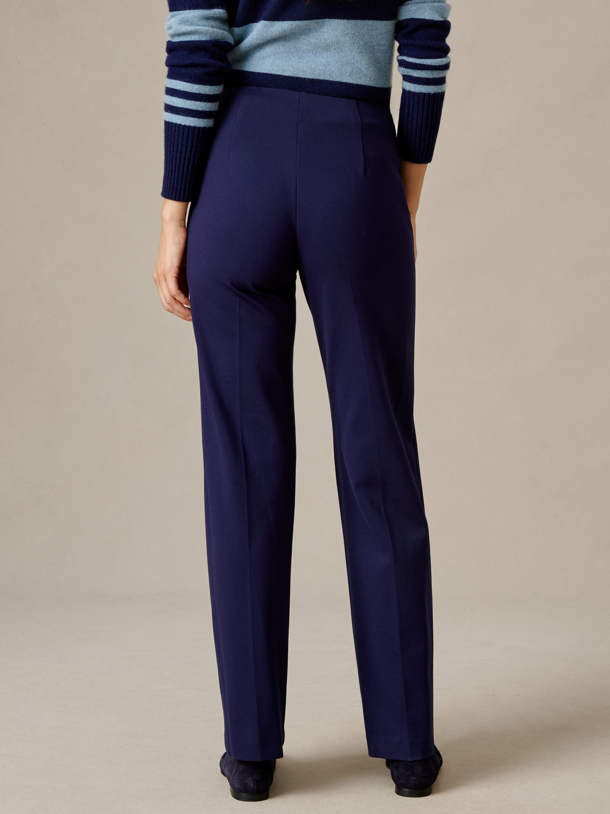 Carter Pants by J.McLaughlin in deep navy with a fluid wide leg silhouette styled with a striped sweater for a polished timeless look