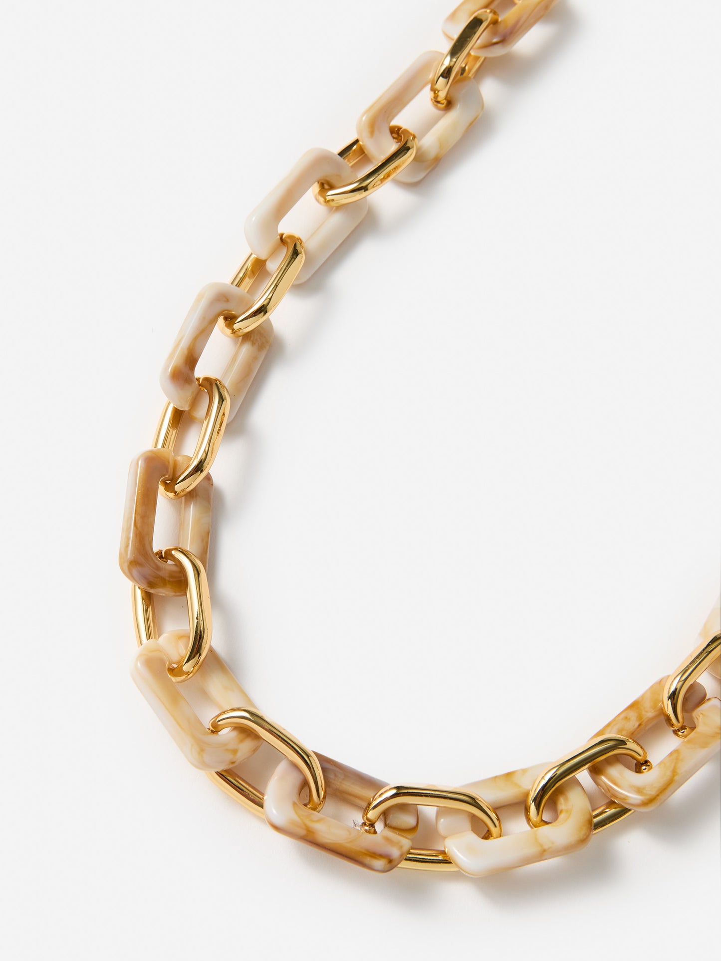 J.McLaughlin Chain link necklace in gold made with brass and resin.