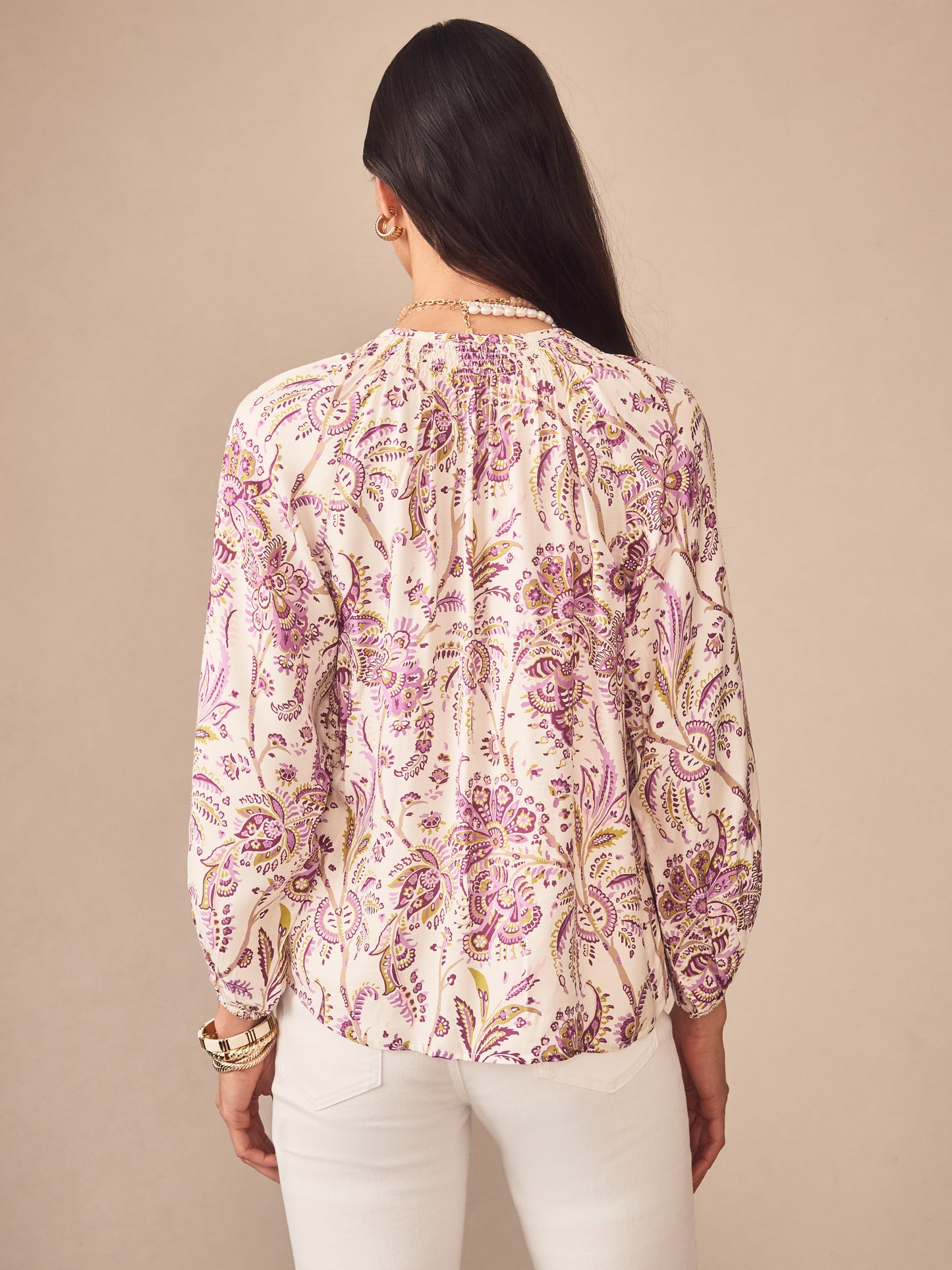 Woman wearing a Constance Silk Blend Blouse in Maxi Heirloom Paisley by J.McLaughlin, featuring an effortlessly stylish design with innovative fabrics and enduring details for a life well-lived.