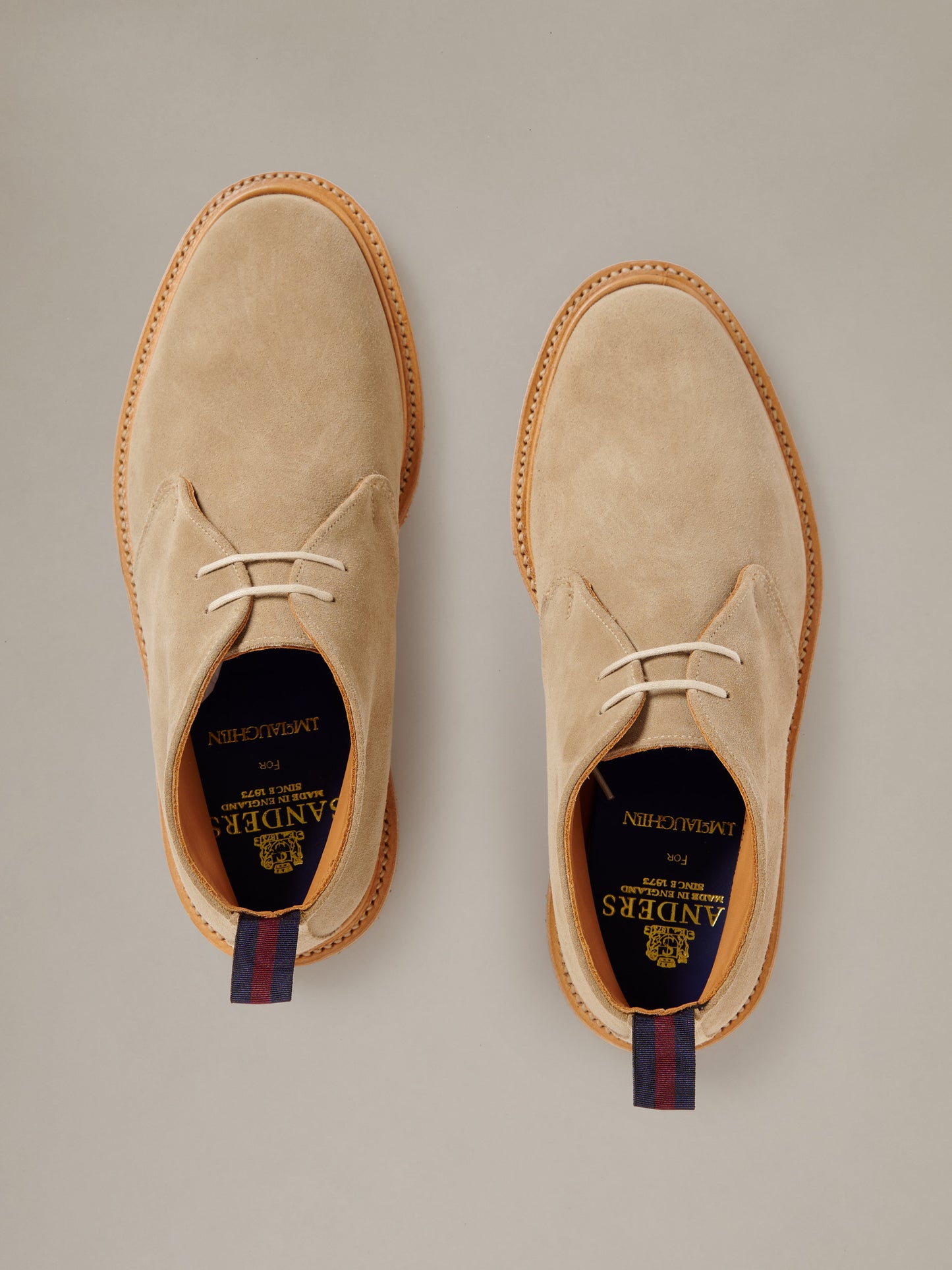 J.McLaughlin Davis Suede Desert Boots in tan suede with lace up fronts and striped heel pull tabs shown from above