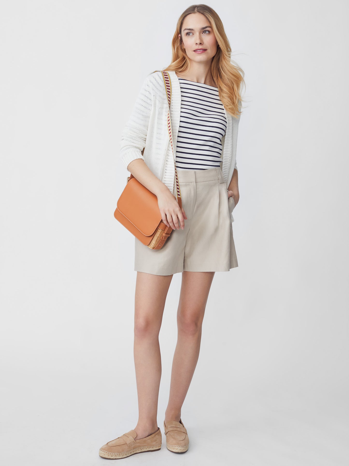 J.McLaughlin model wears Dawn Cardigan in White made with Linen and Cotton.