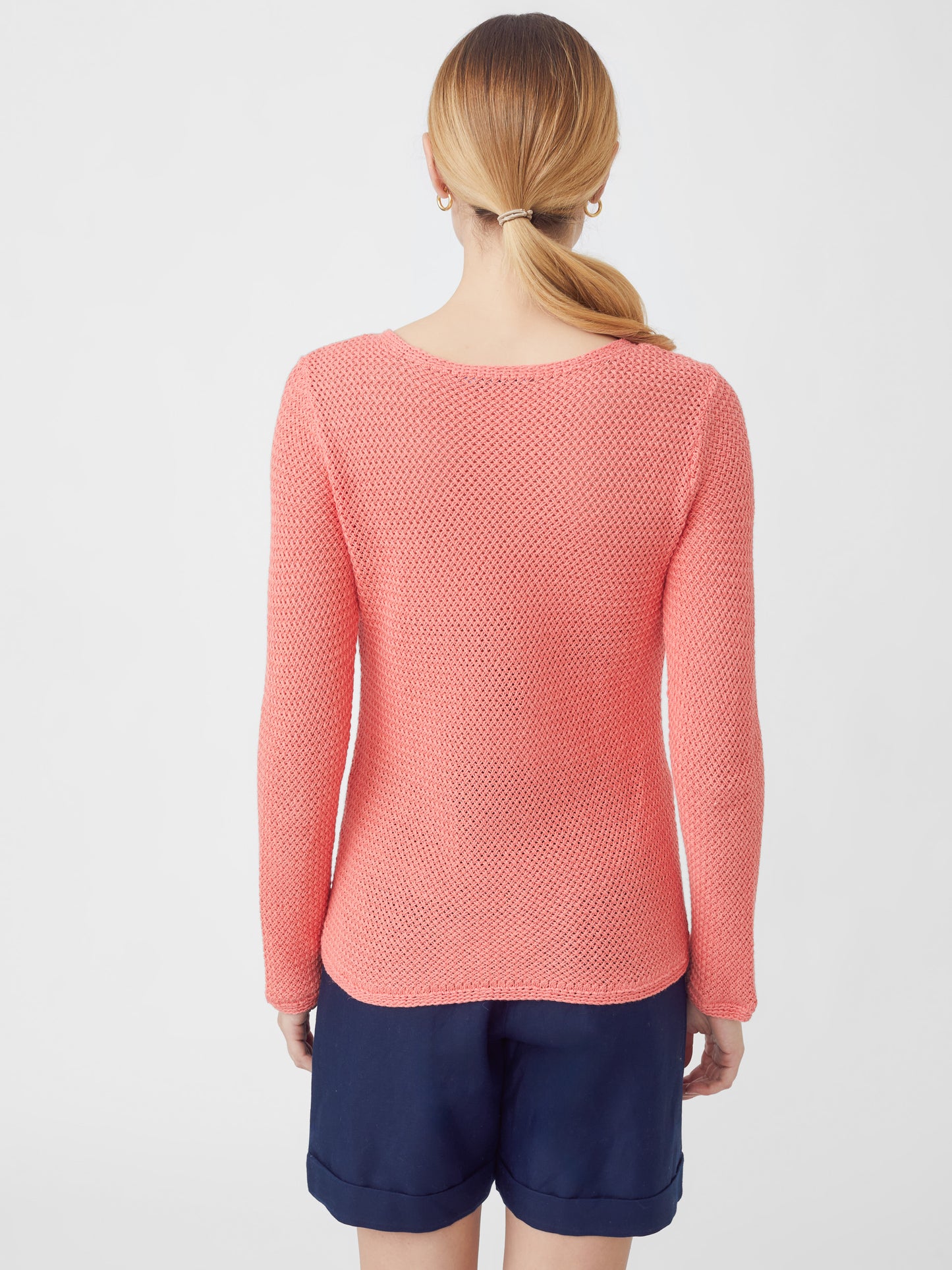 J.McLaughlin model wears Donna Linen Sweater in Papaya made with Linen.