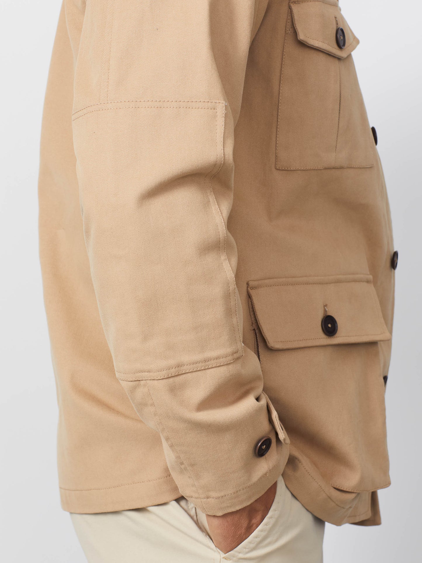 Model wearing J.McLaughlin Duster shirt jacket in khaki made with cotton and elastane.