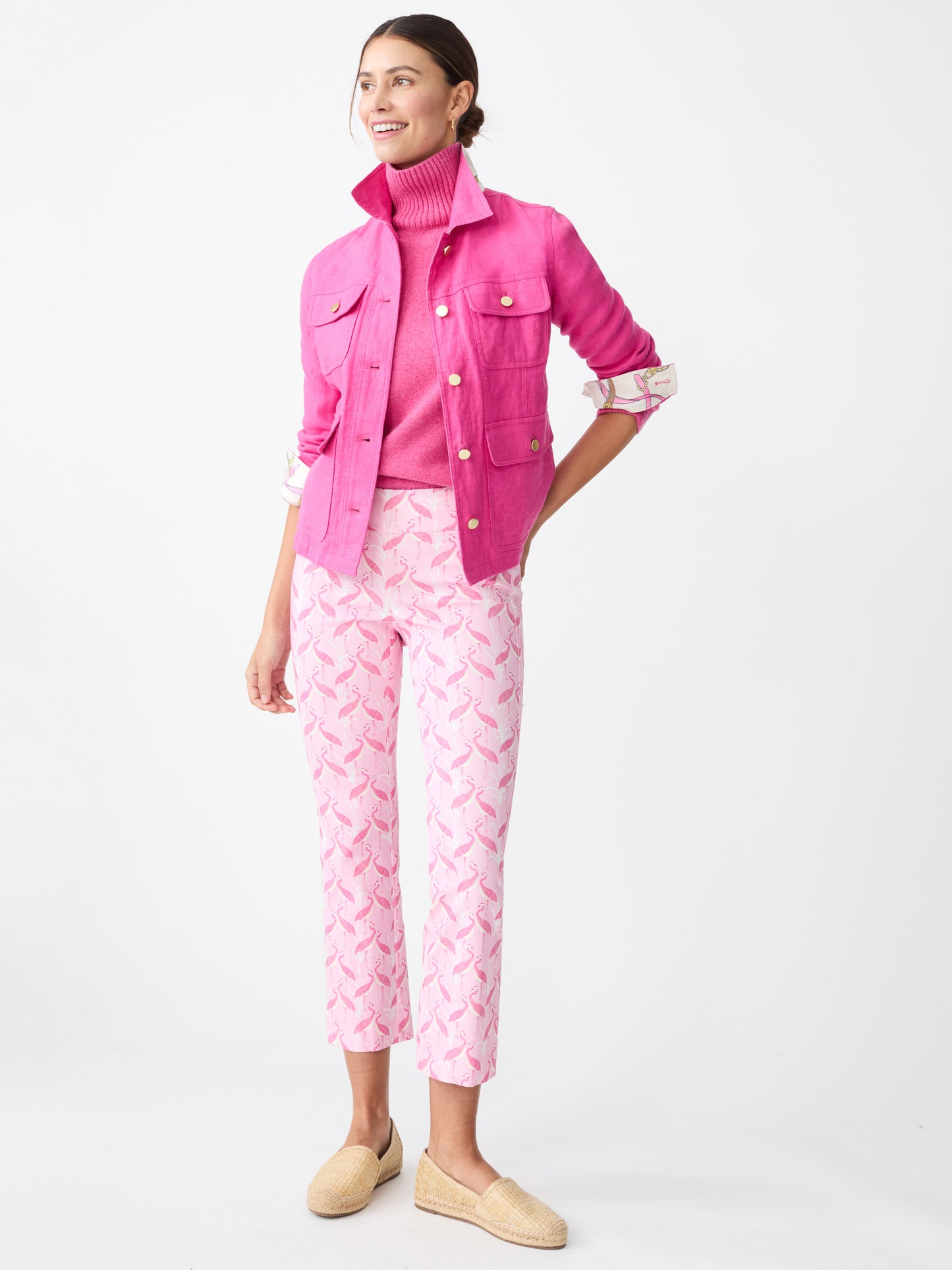 Model wearing J.McLaughlin Ivy pants in pink/light pink made with Amelia cloth.