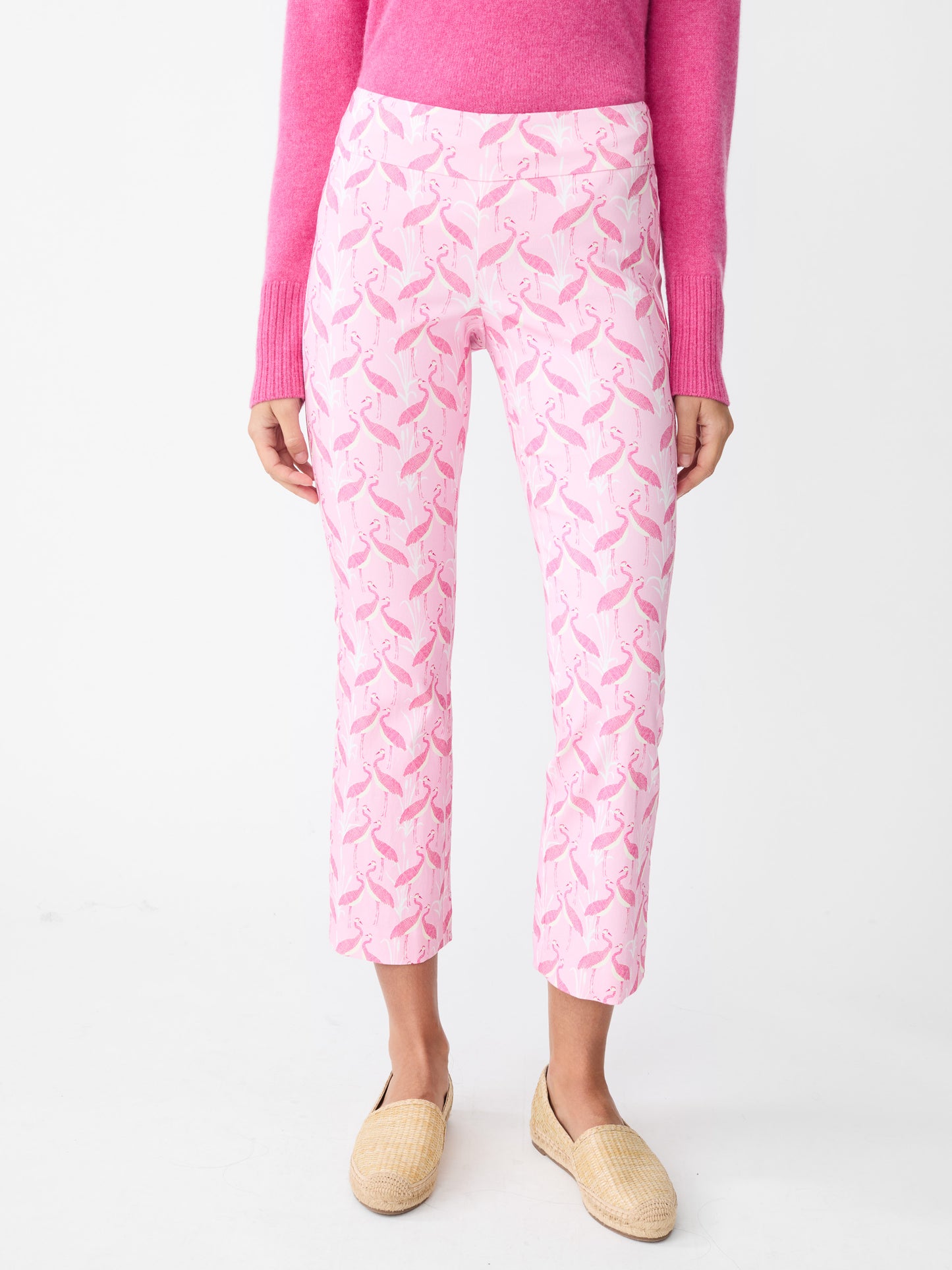 Model wearing J.McLaughlin Ivy pants in pink/light pink made with Amelia cloth.