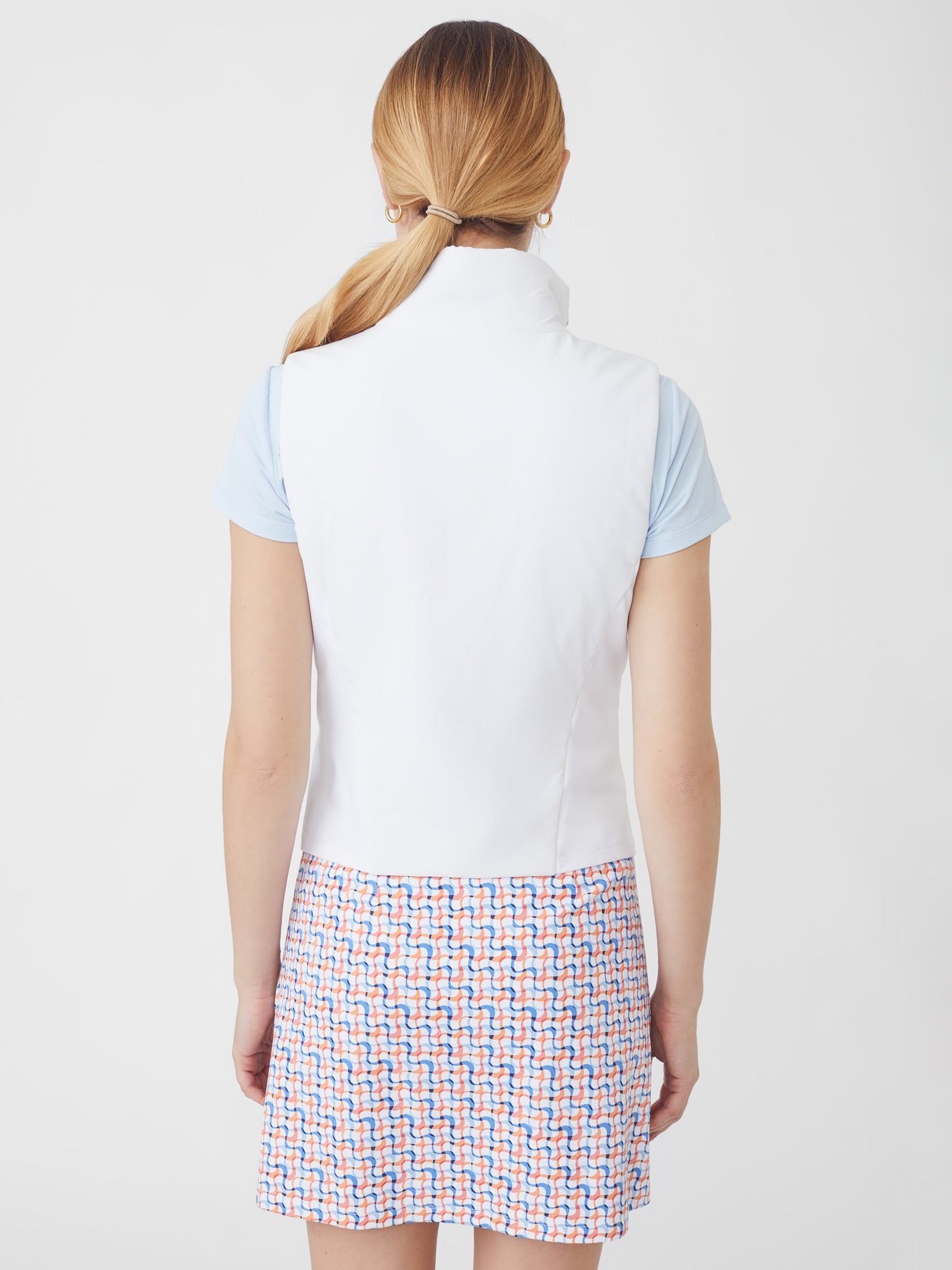 J.McLaughlin model wears Katarina Vest in White made with Polyester and Spandex.