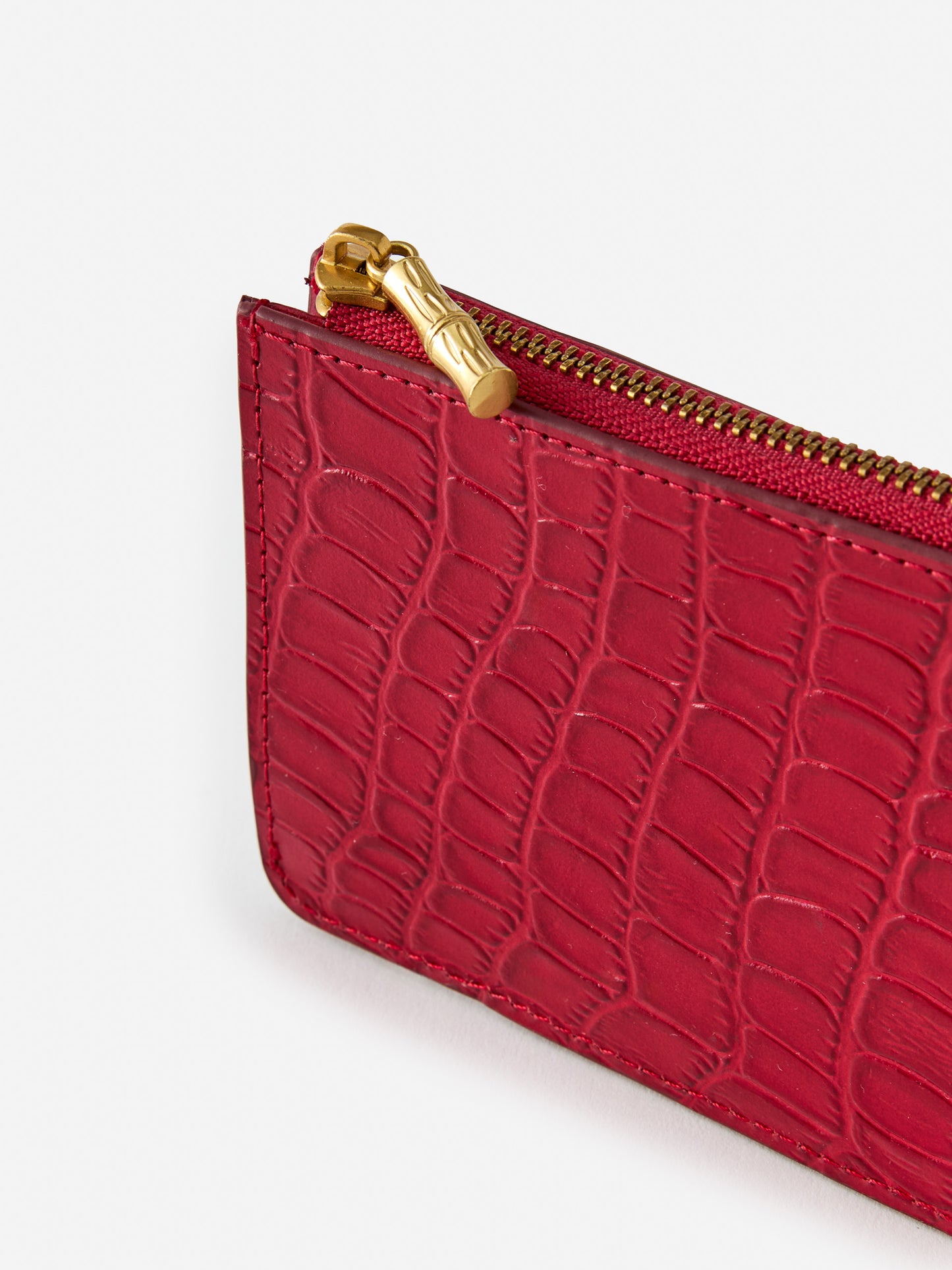 J.mcLaugjlin Libi card case in red made with leather.