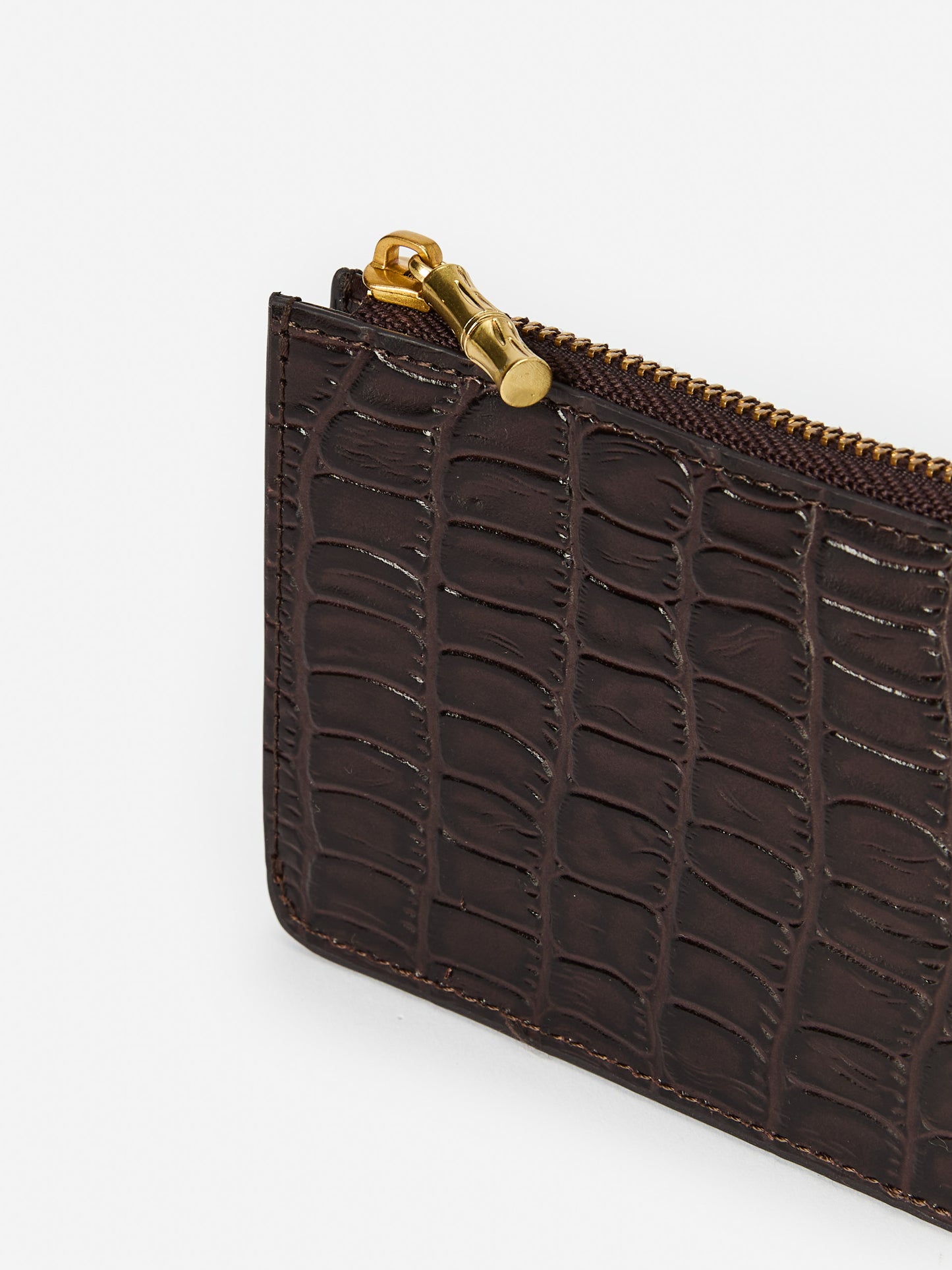 J.McLaughlin Libi wallet in dark brown made with crocodile.