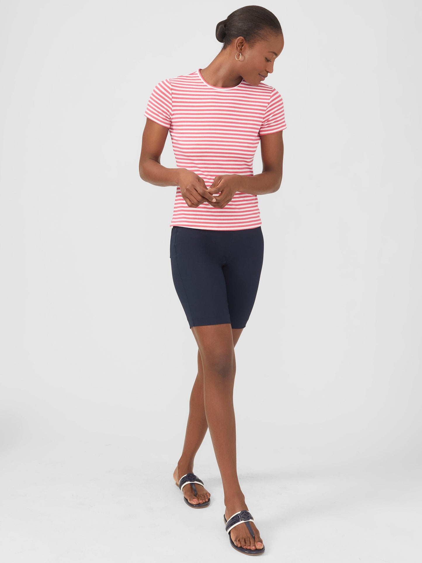 Model wearing J.McLaughlin Masie shorts in winter navy made with Amelia cloth.
