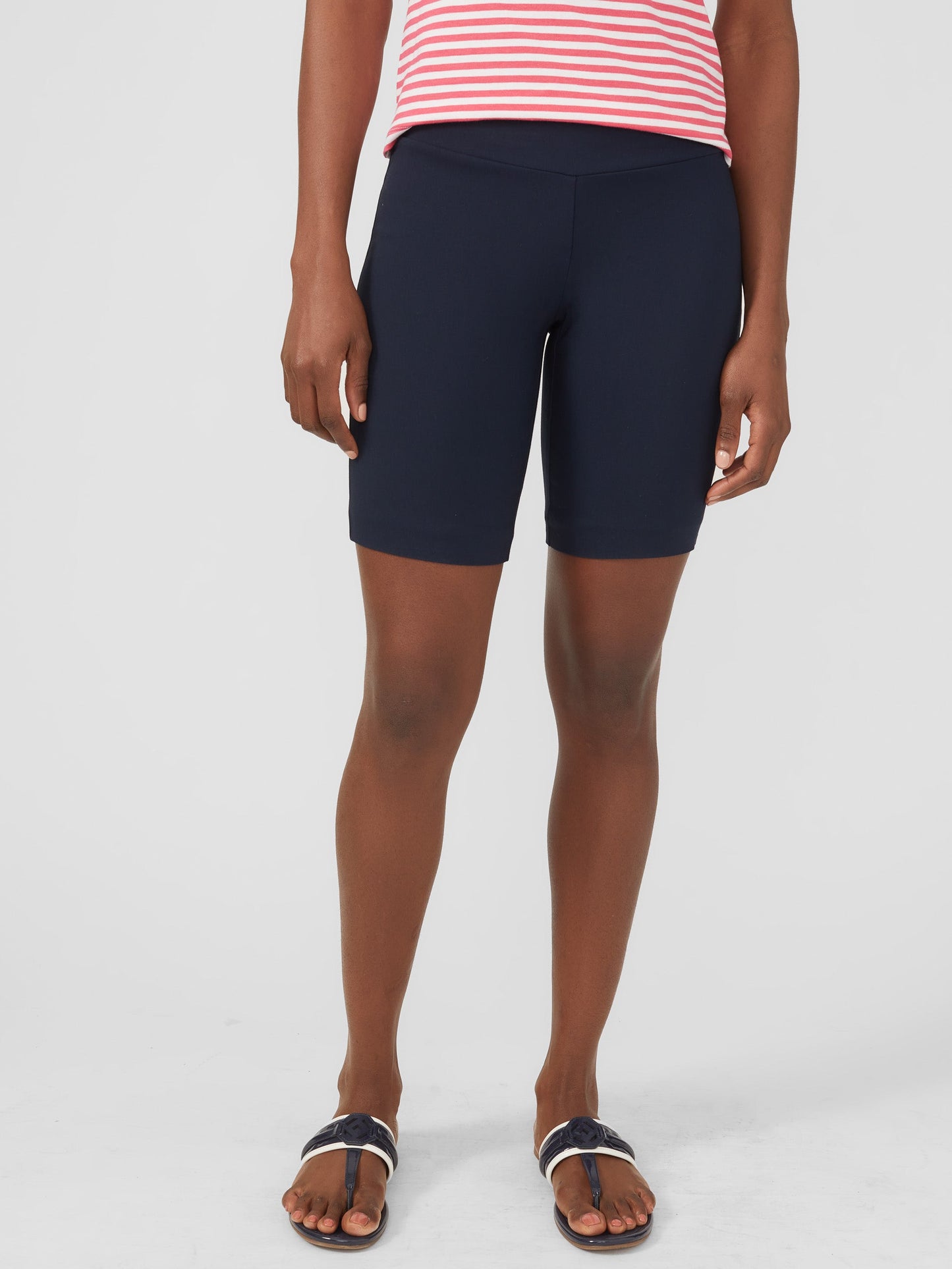 Model wearing J.McLaughlin Masie shorts in winter navy made with Amelia cloth.