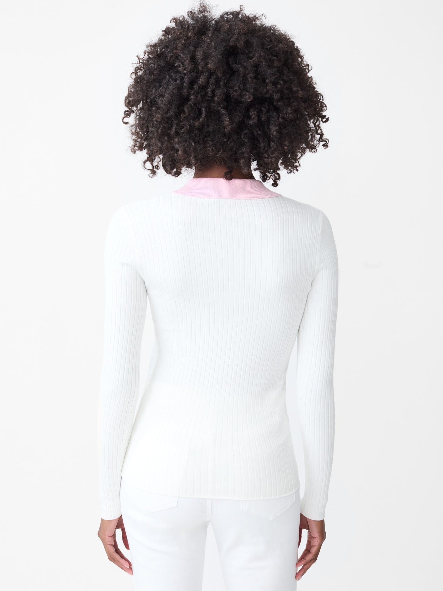 Model wearing J.McLaughlin Micaela sweater in white/pink made with cotton/modal.