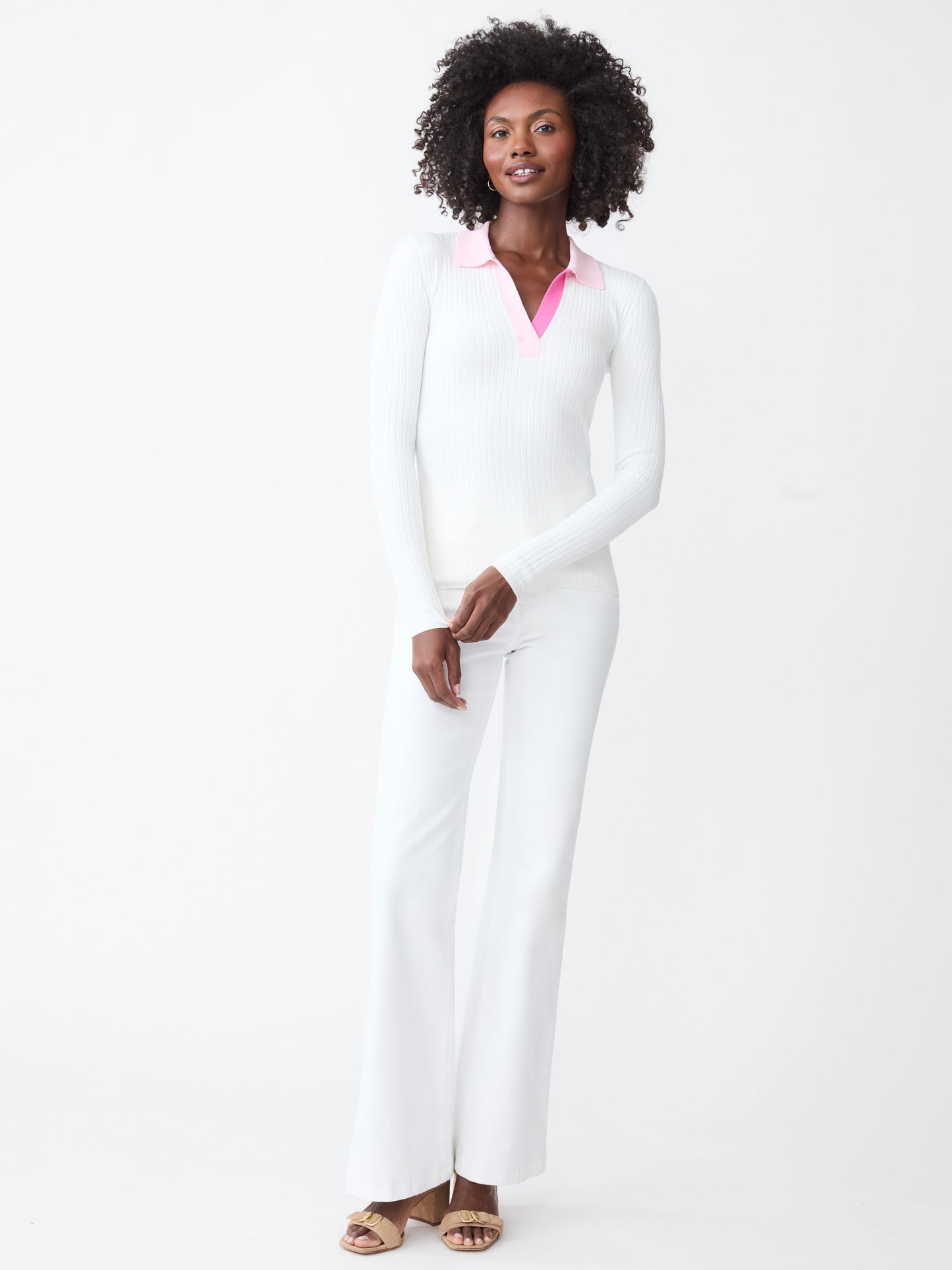 Model wearing J.McLaughlin Micaela sweater in white/pink made with cotton/modal.