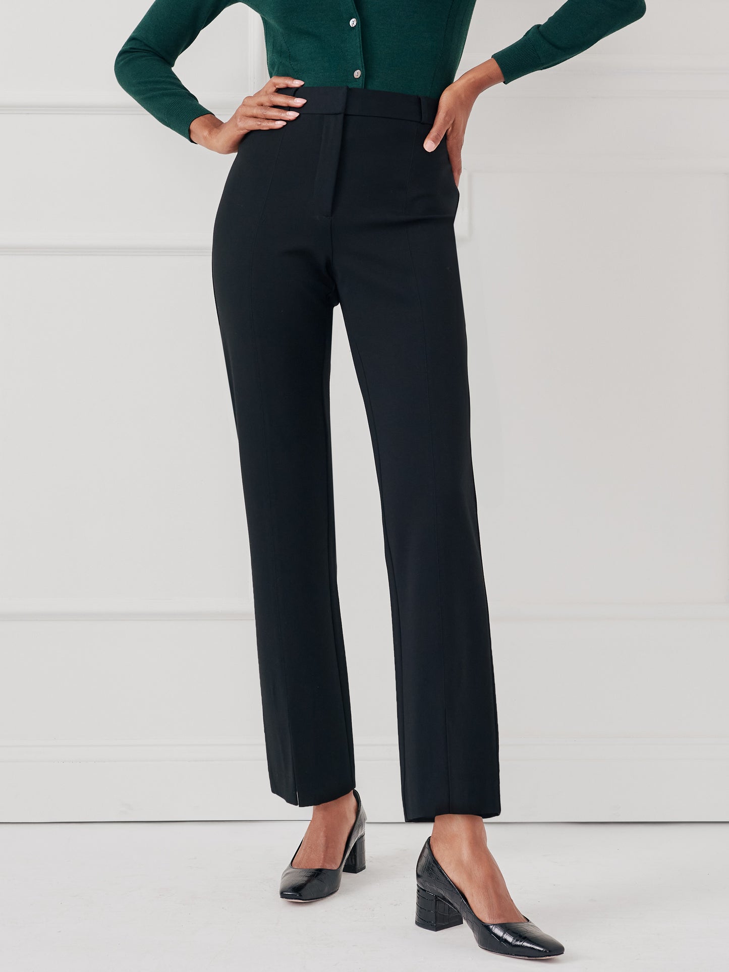 Model wearing J.McLaughlin Deanne pants in black made with Bainbridge fabric.