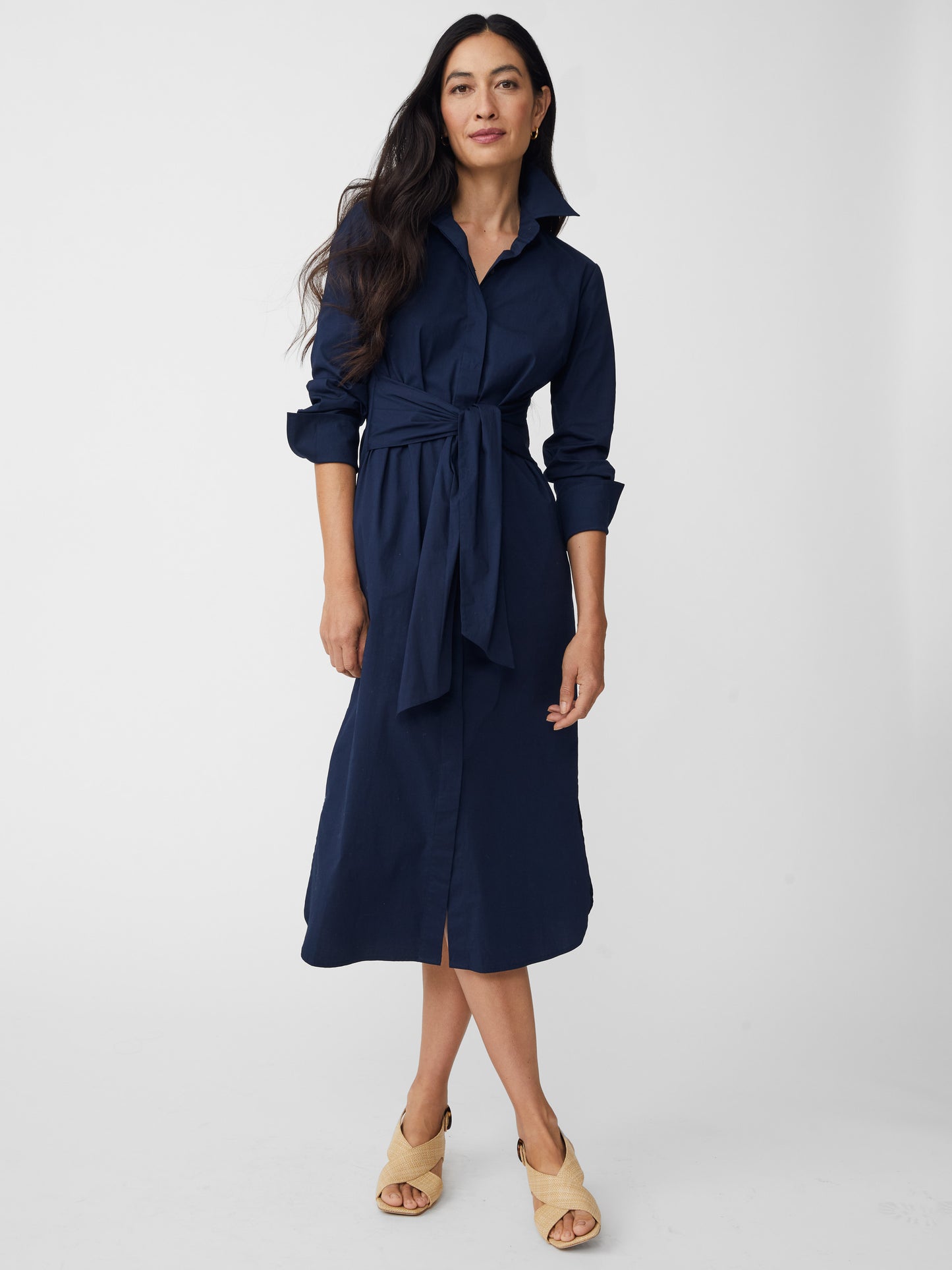 Model wearing J.McLaughlin Orla dress in navy made with cotton/nylon/elastane.