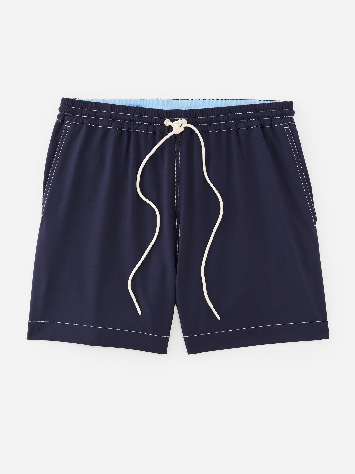 J.McLaughlin Outrigger swim trunks in navy made with polyester and spandex.