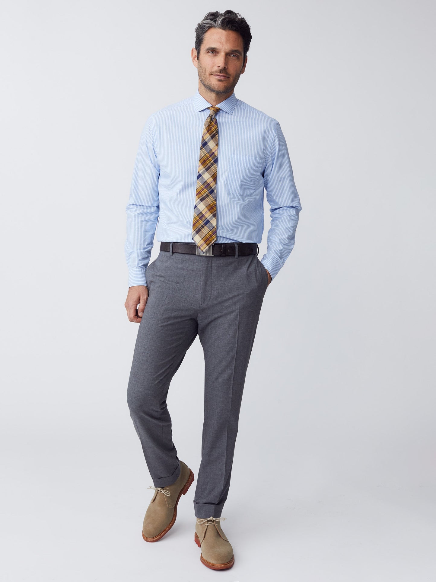 Model wearing J.McLaughlin Oxford pants in heather charcoal made with wool/elastane.