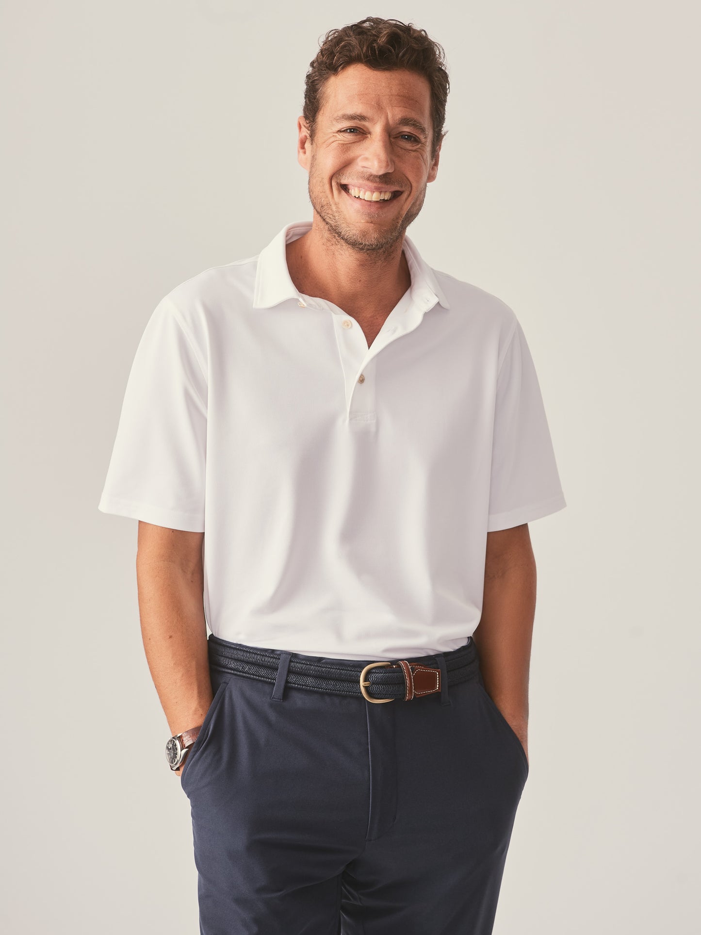J.McLaughlin Springer performance polo in white made with polyester/spandex