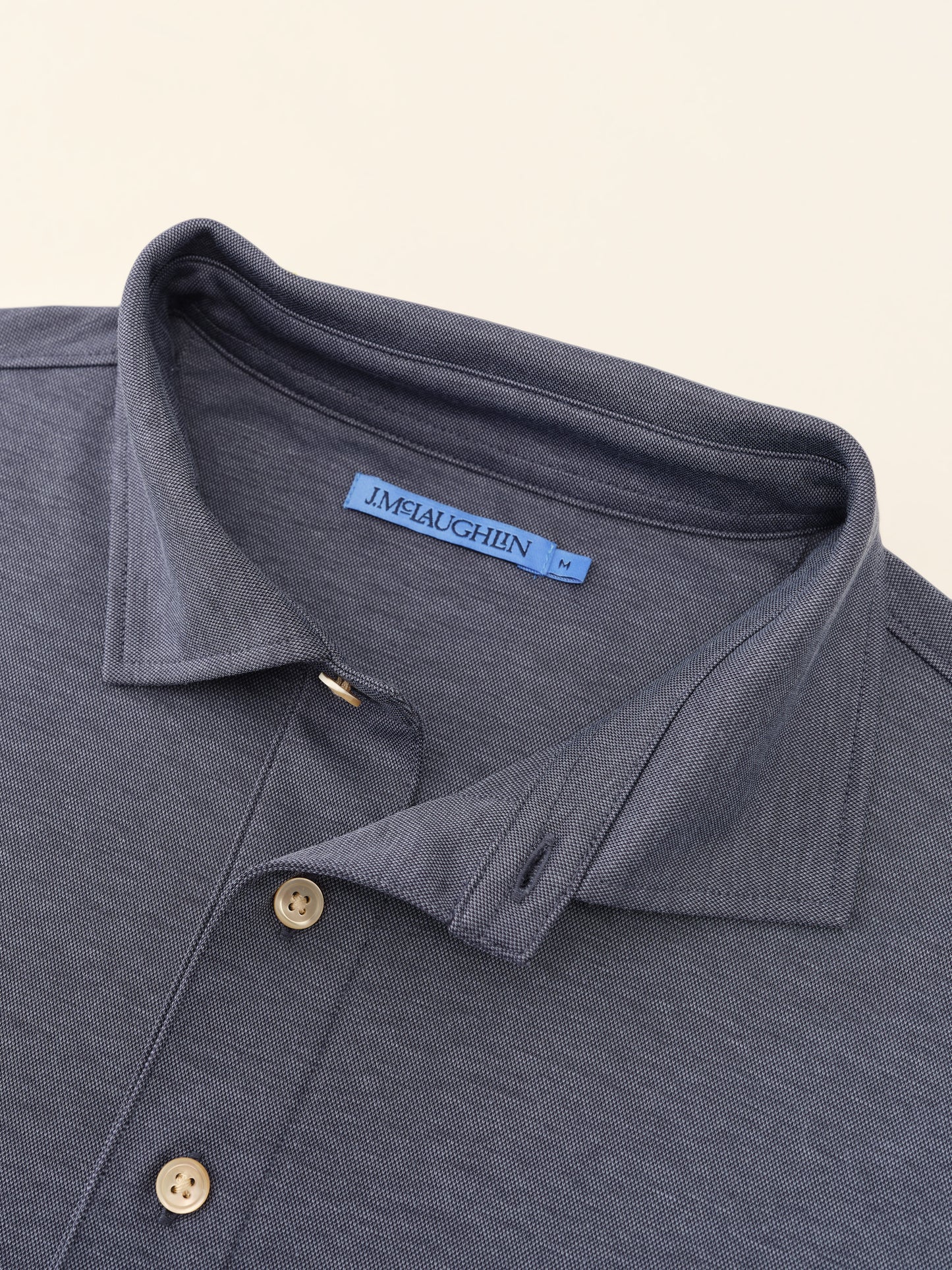 J.McLaughlin Peak polo in Midnight made with Polyester.