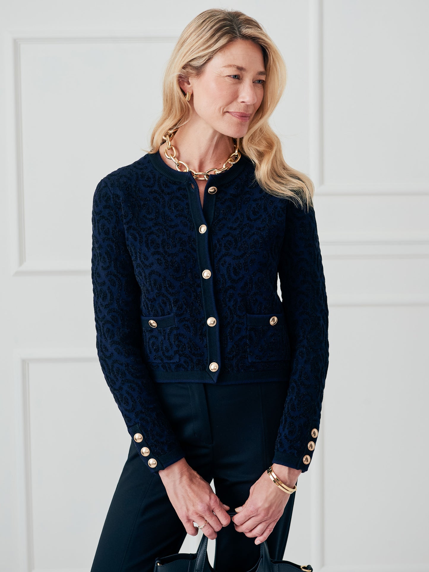 J.McLaughlin Reva sweater in black/navy made with polyester.