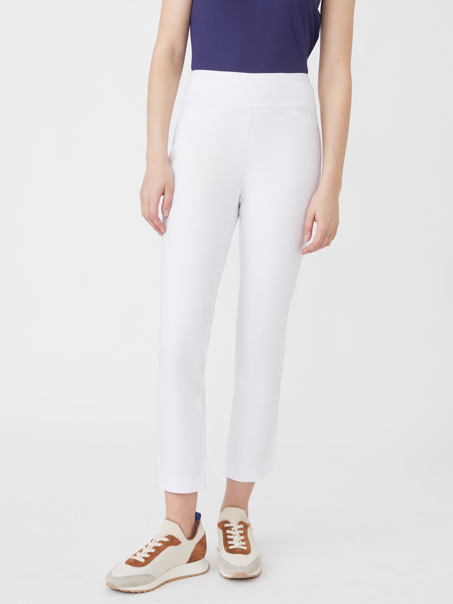 Model wearing J.McLaughlin Romilly pants in white made with Amelia cloth.