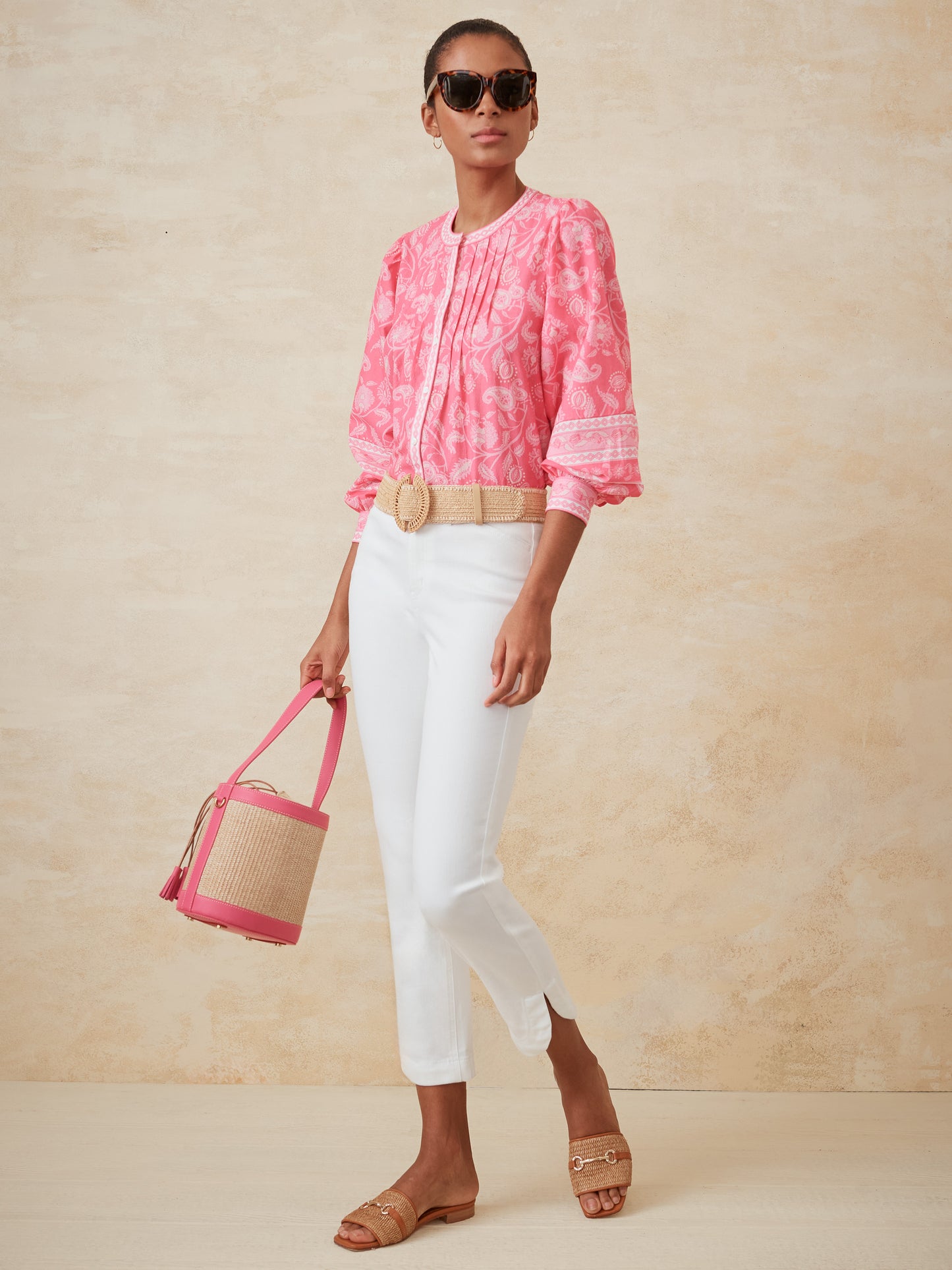 J.McLaughlin Suki handbag in natural/pink made with straw and leather.